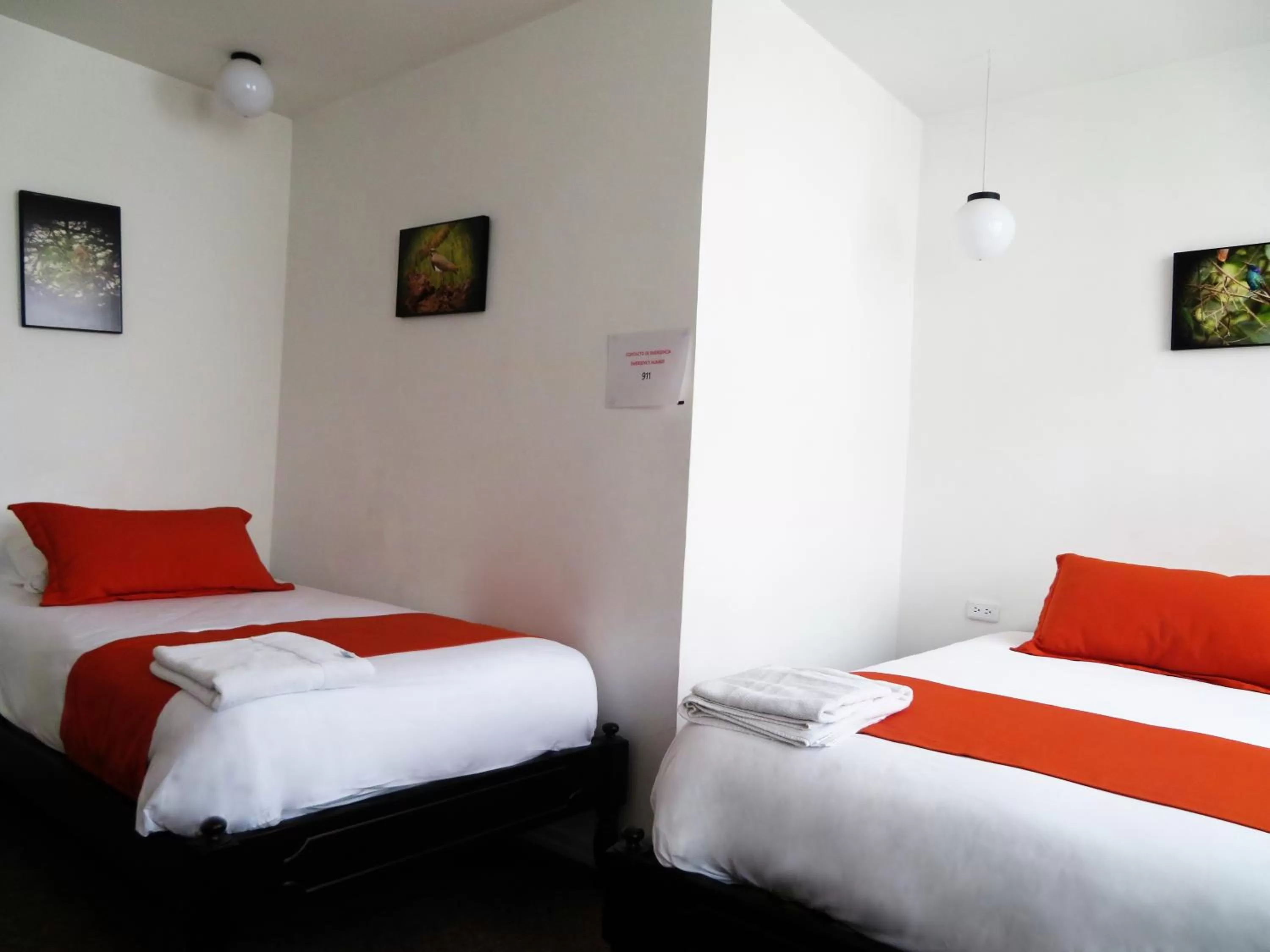 Bed in Bird Garden Guest House