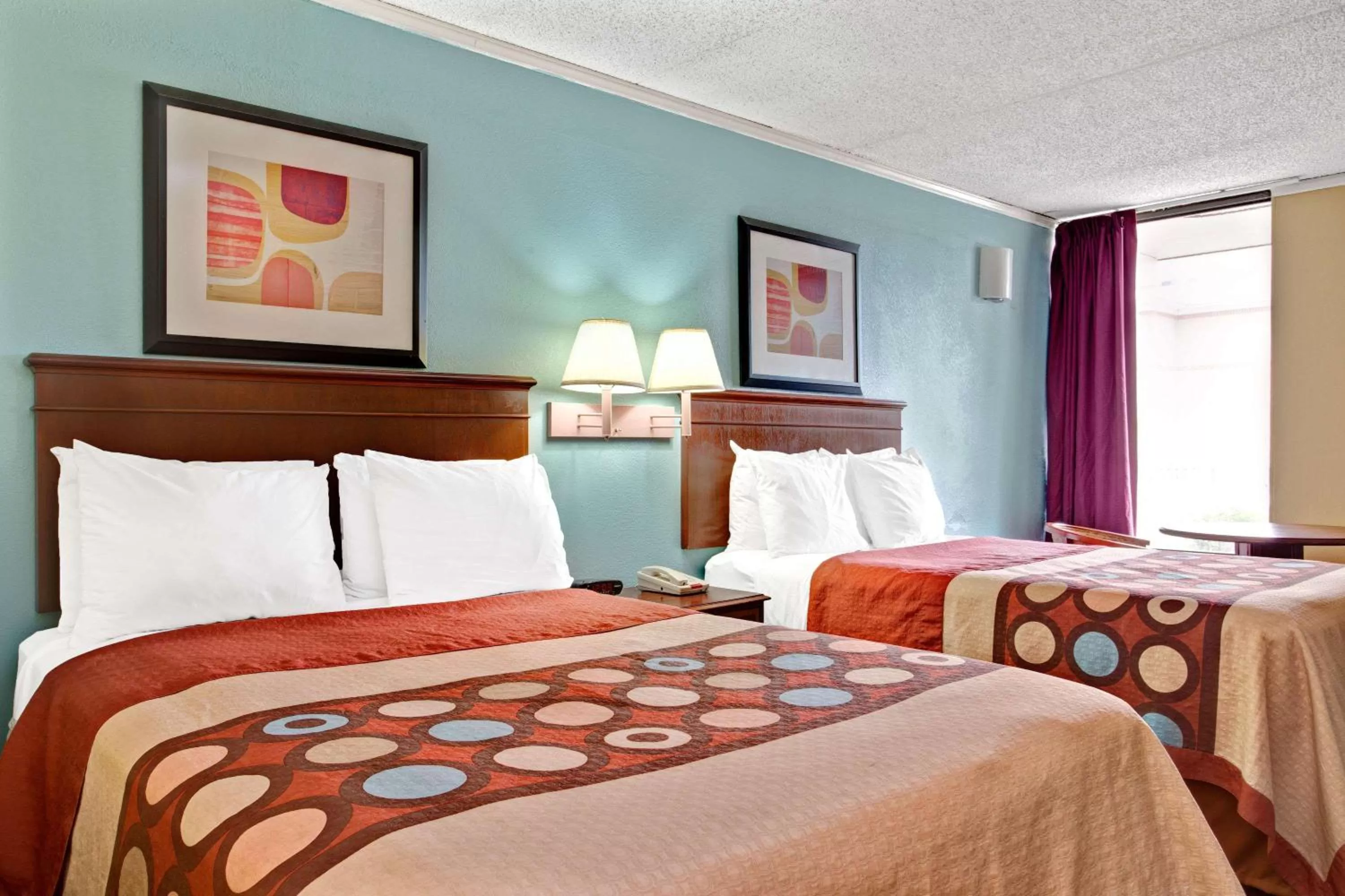 Photo of the whole room, Bed in Super 8 Downtown Raleigh