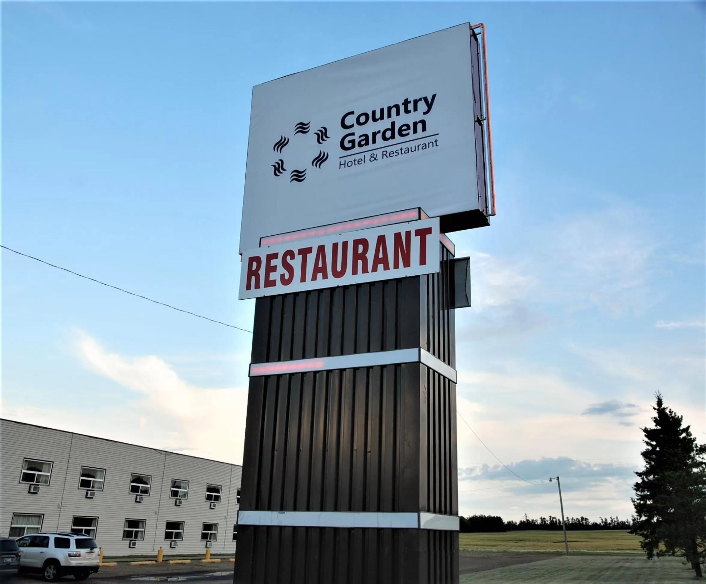 Property logo or sign in Country Garden Inn & Restaurant