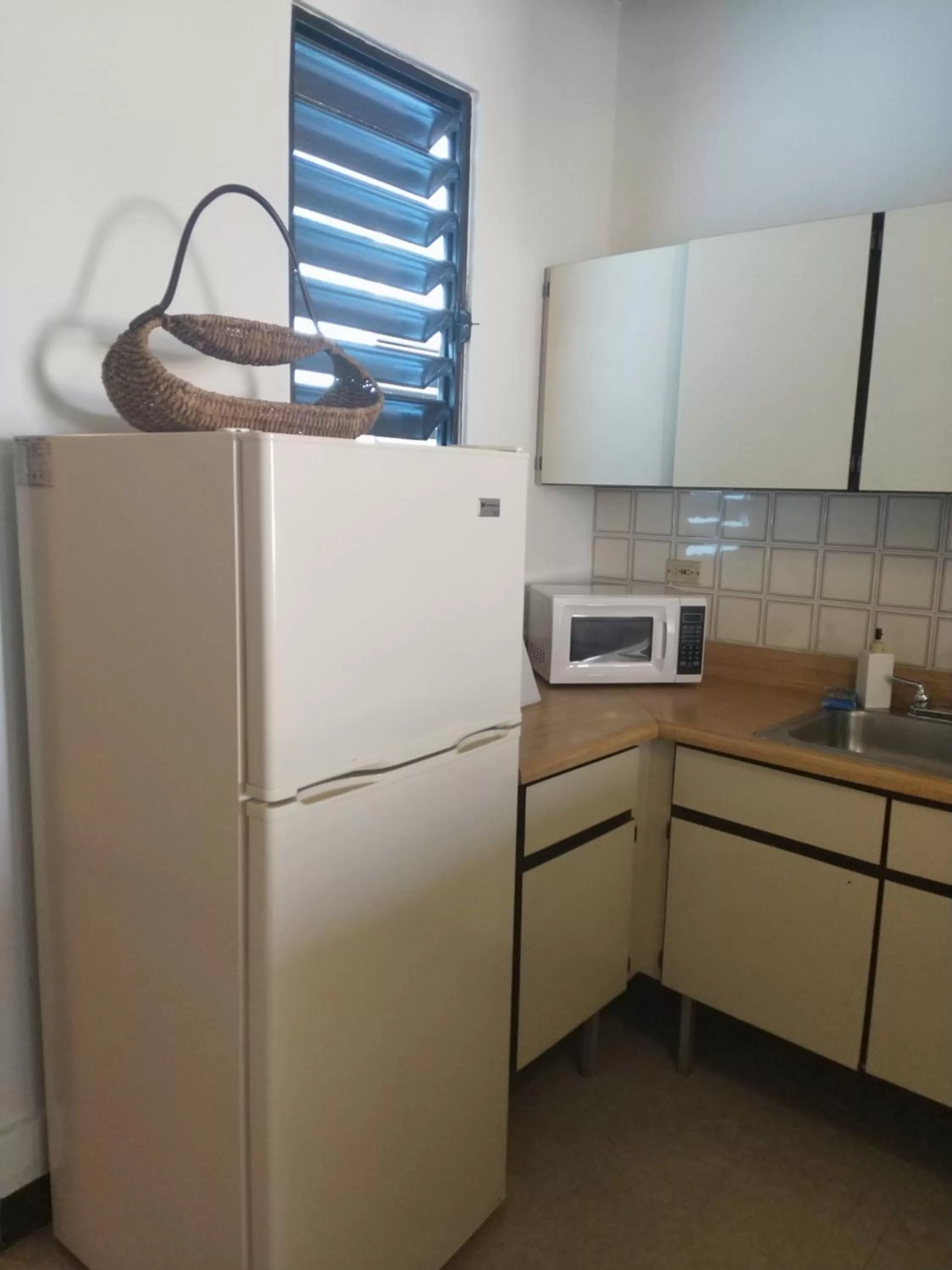 Kitchen or kitchenette in La Capitana Old San Juan Building