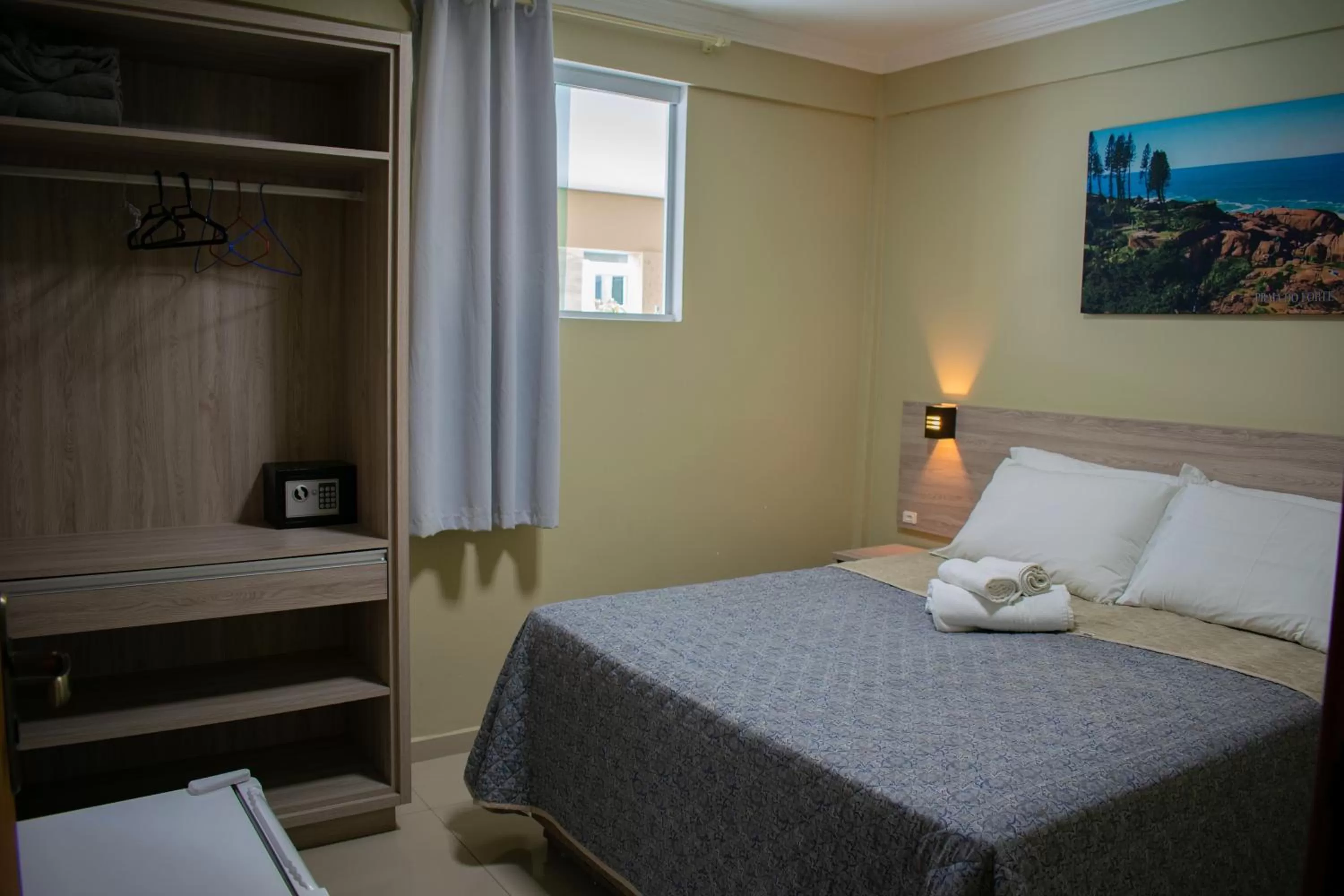 Bed in Pousada Tissiano