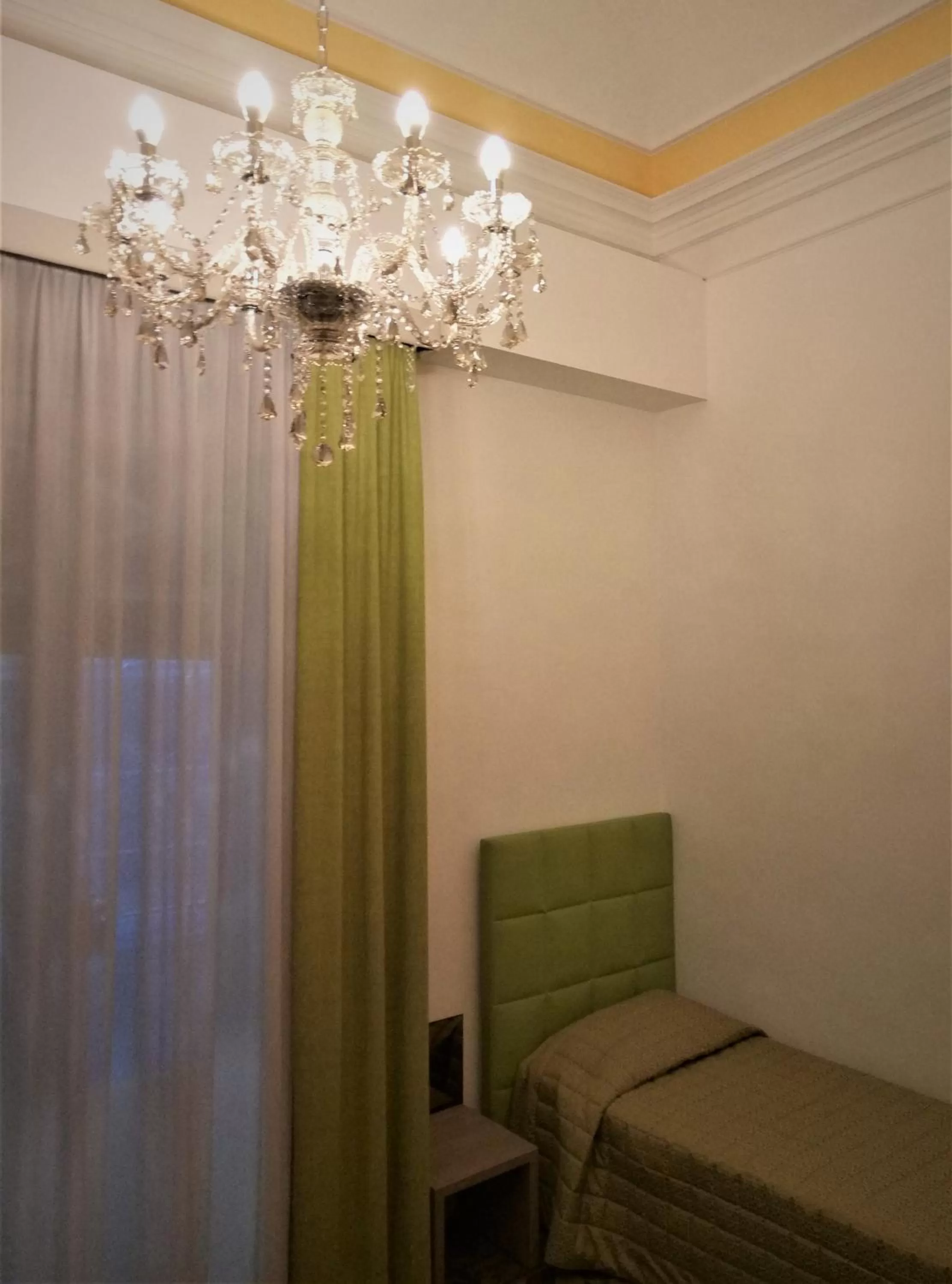 Bed in Moonlight Hotel&Suites