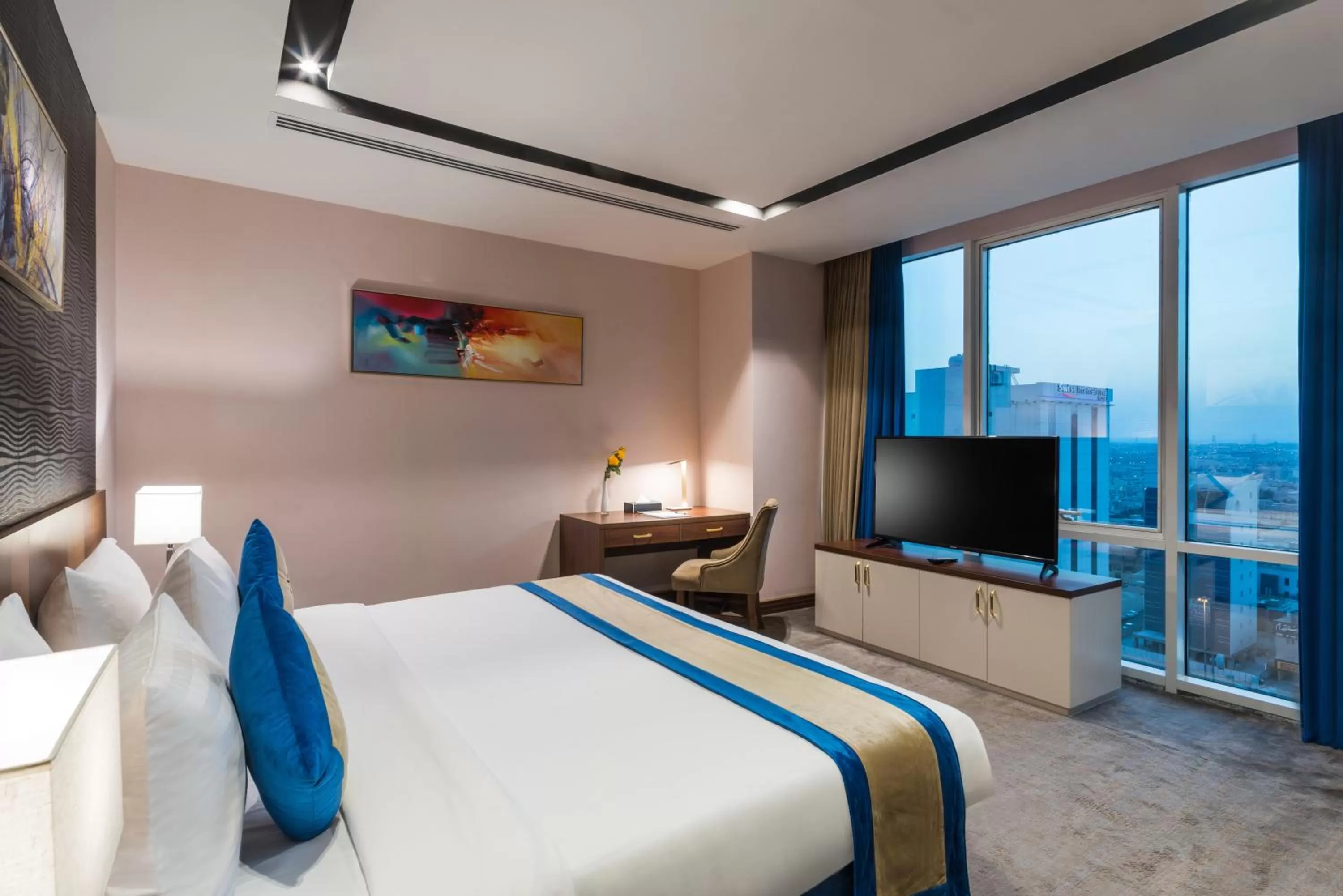 Bed in Al Malqa Elite Hotel