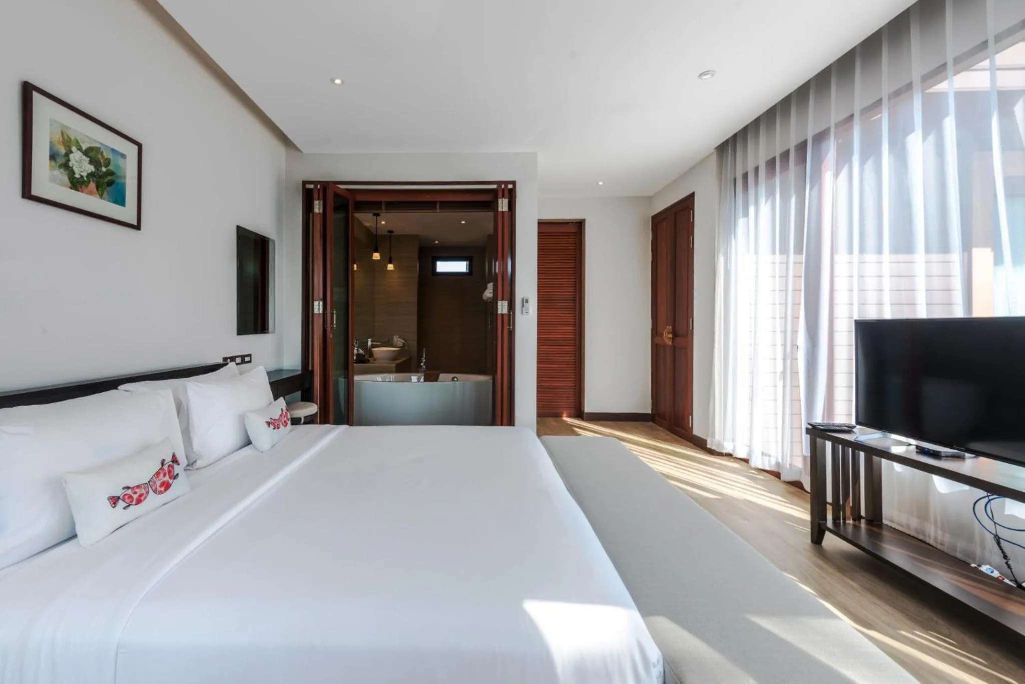 Bed in Triple Tree Beach Resort