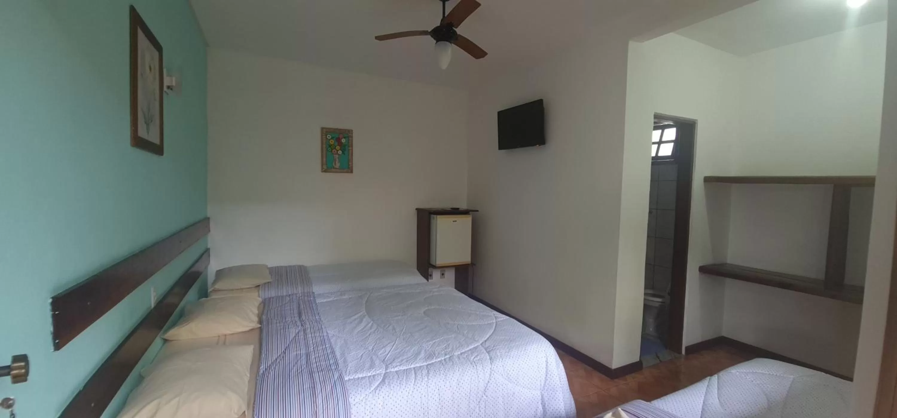 Bed in Pousada Flor de Paraty