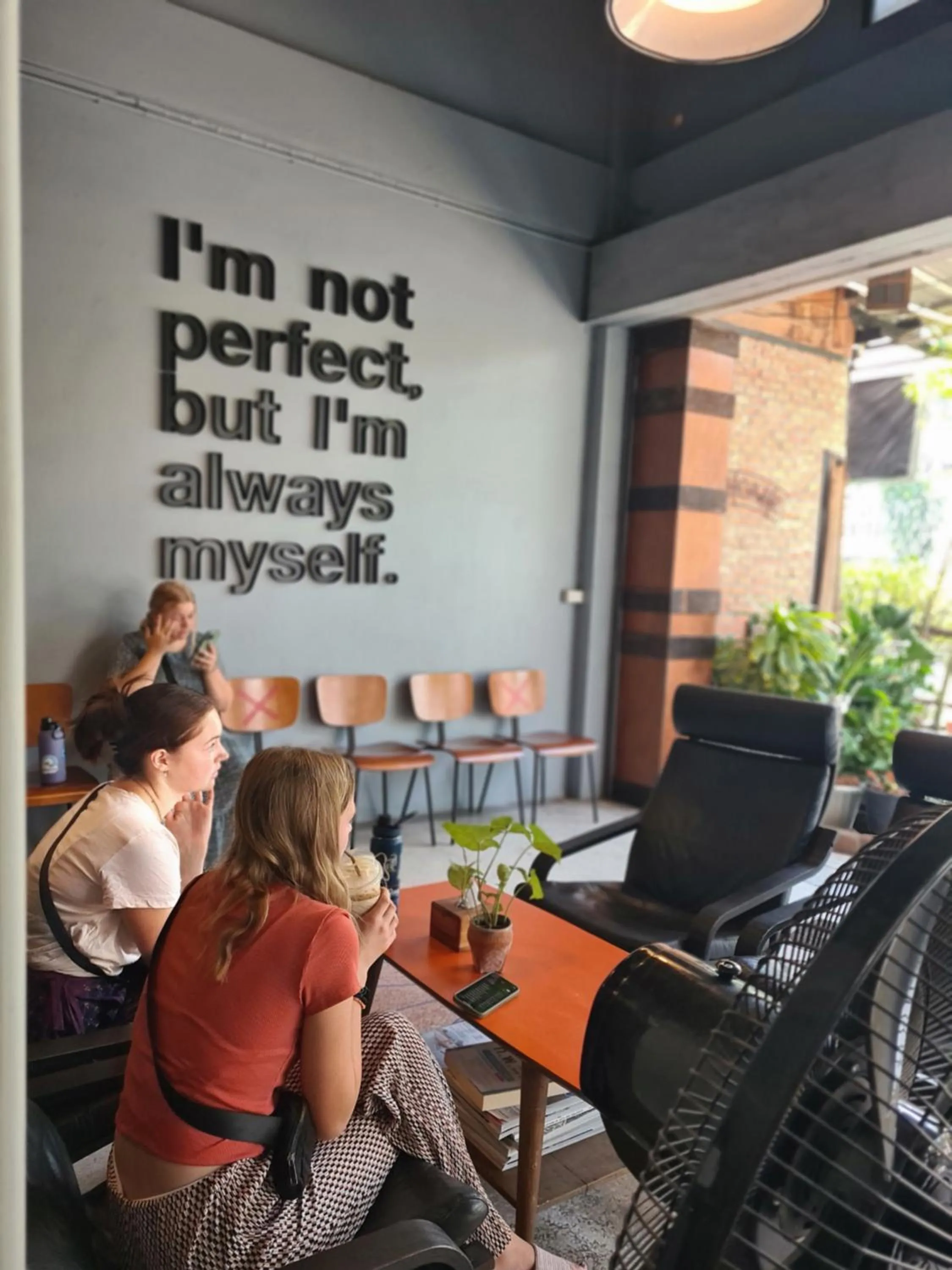 Communal lounge/ TV room in The 8 Factory Hotel Phitsanulok