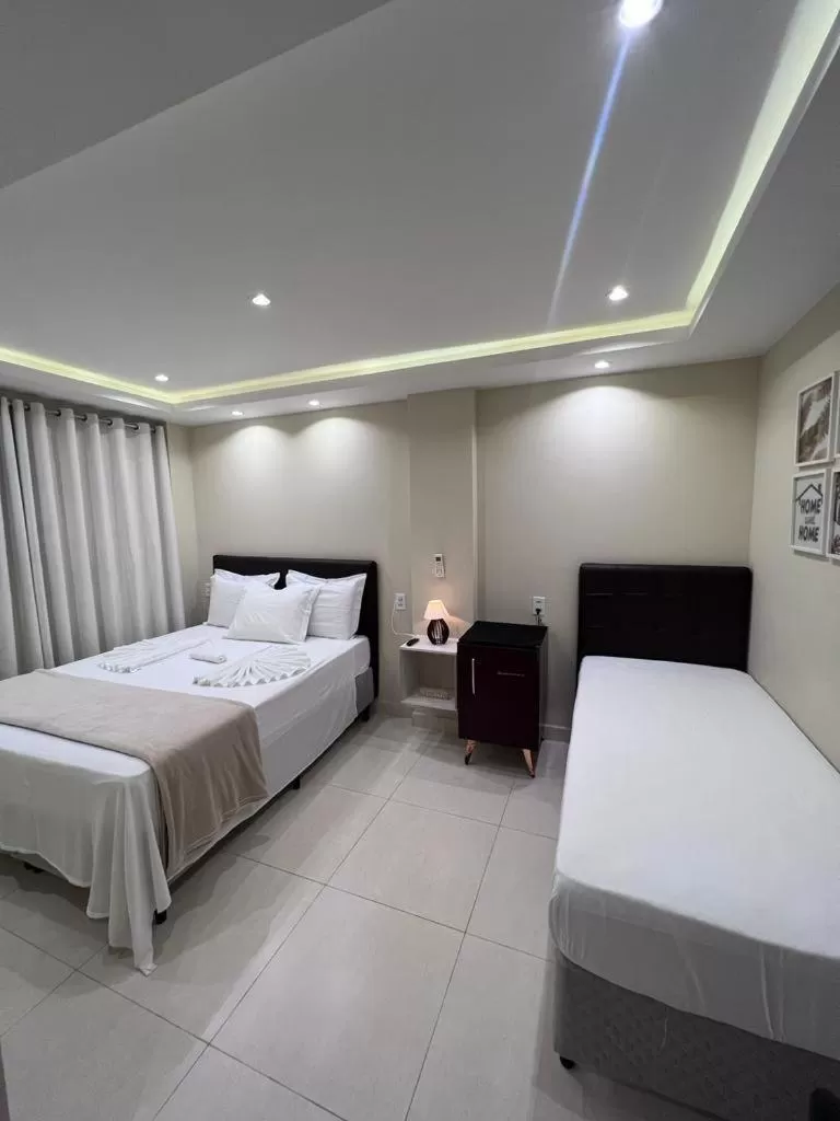 Bed in Pousada Arraial Tropical