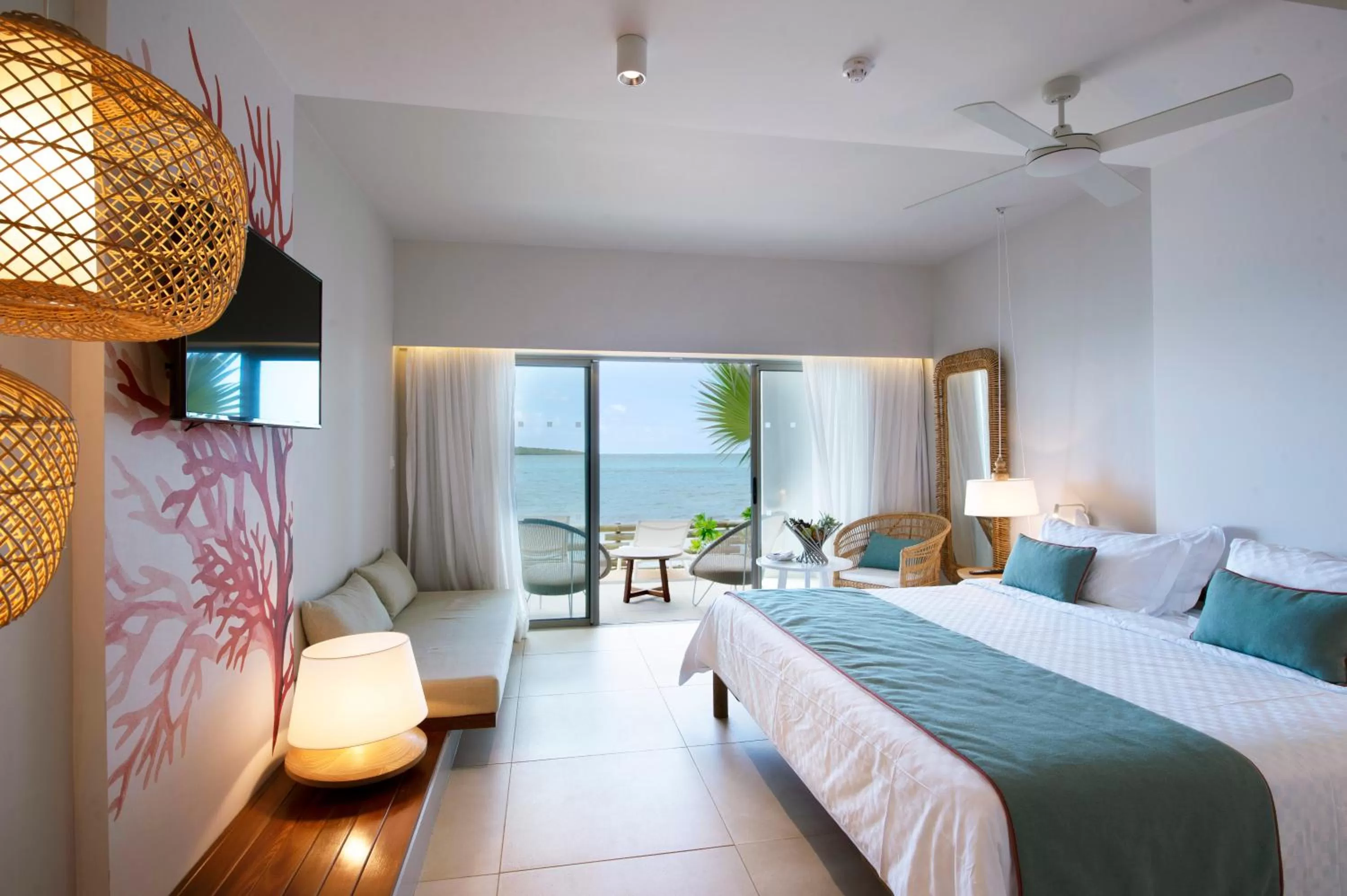 Photo of the whole room, Bed in Preskil Island Resort