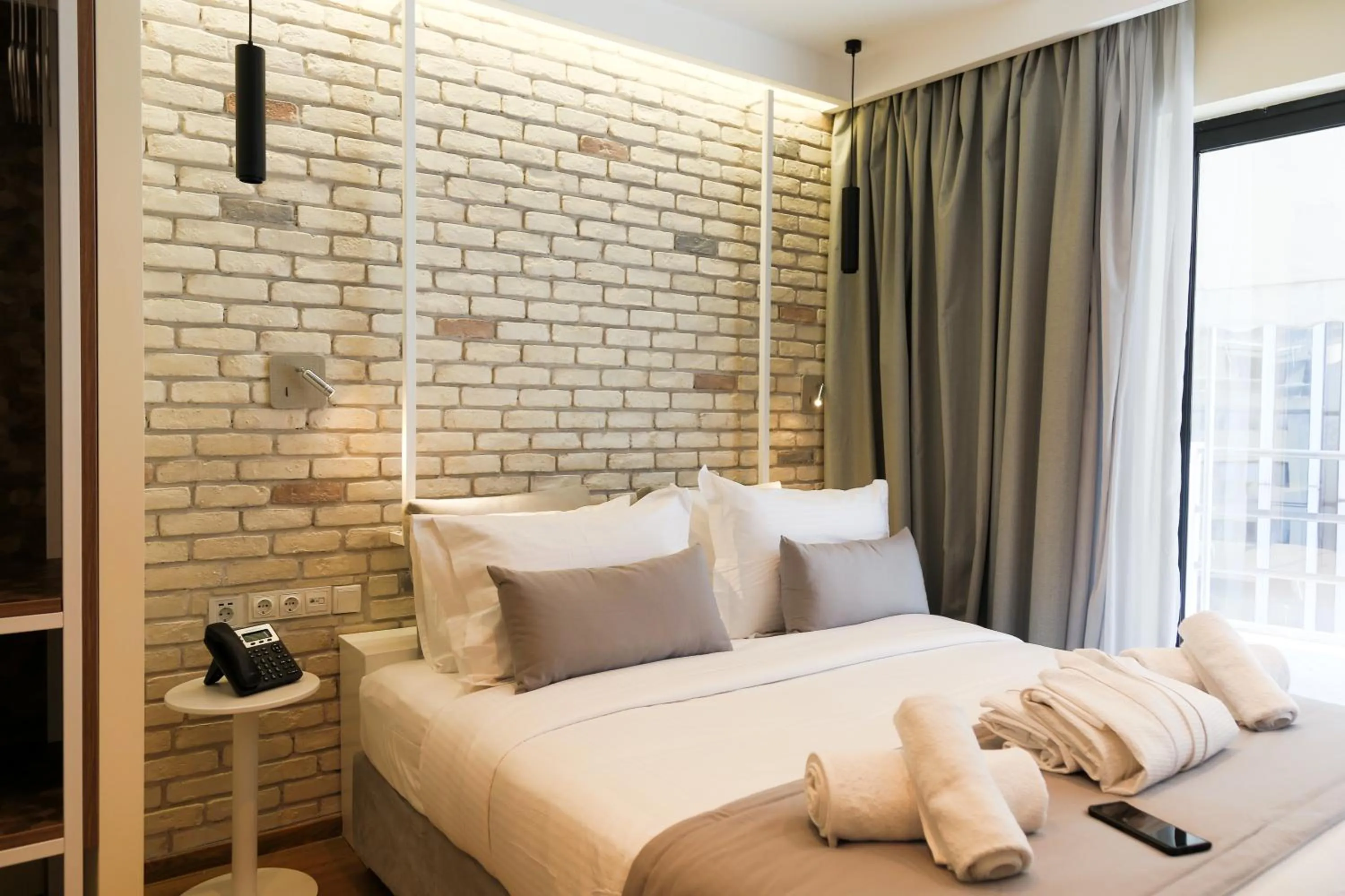 Bed in Hotel @Syngrou Fix