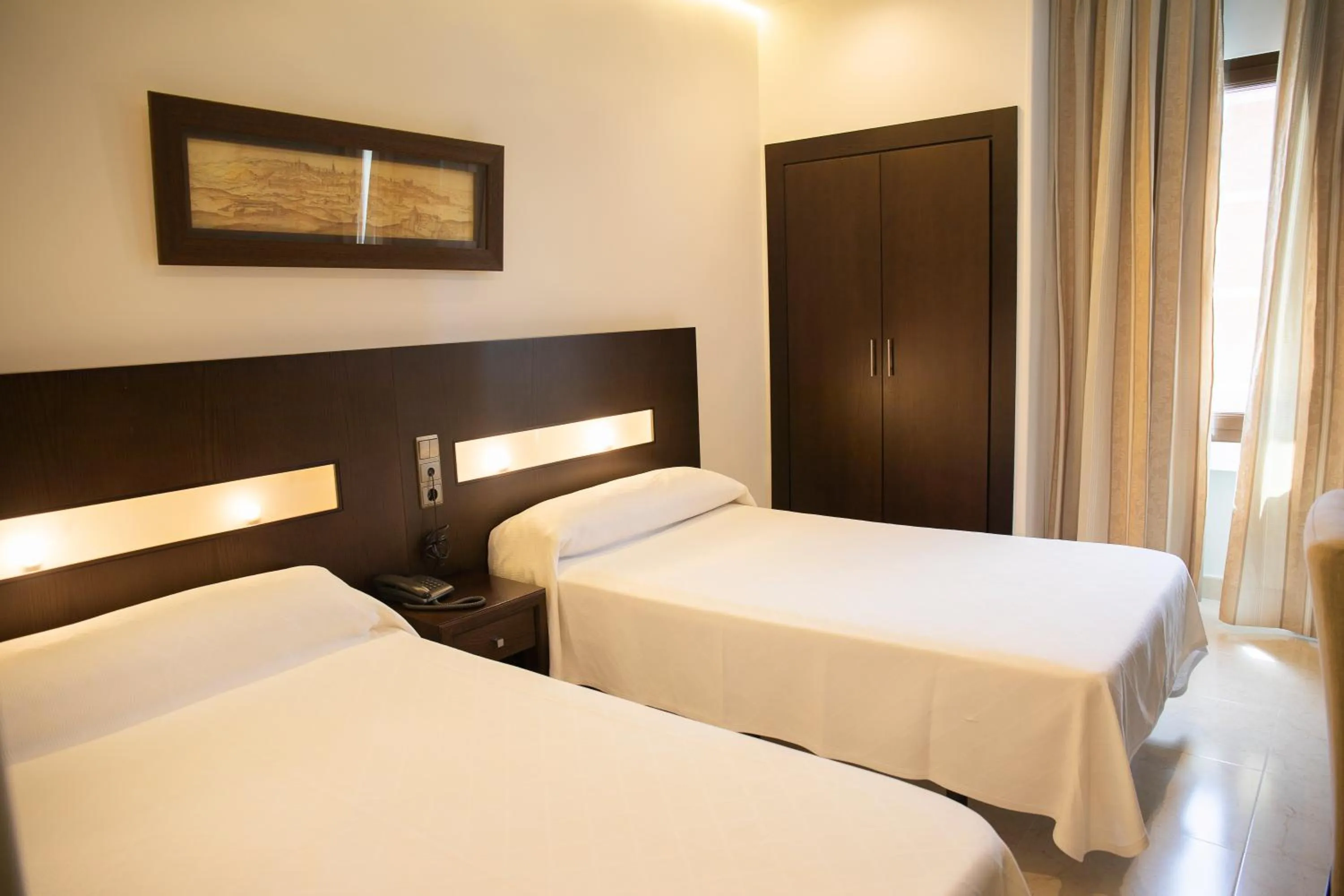 Bed in Hotel El Mesón