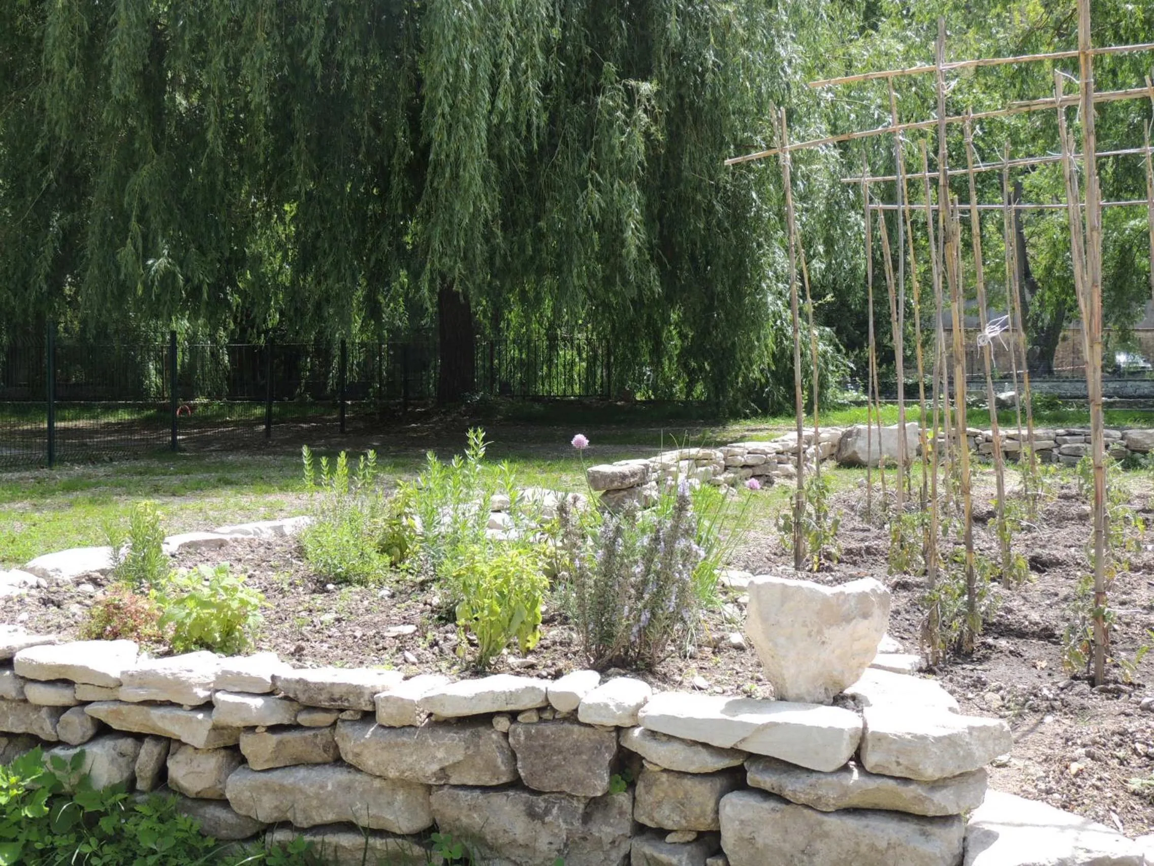 Garden in Logis Hôtel Restaurant du Parc