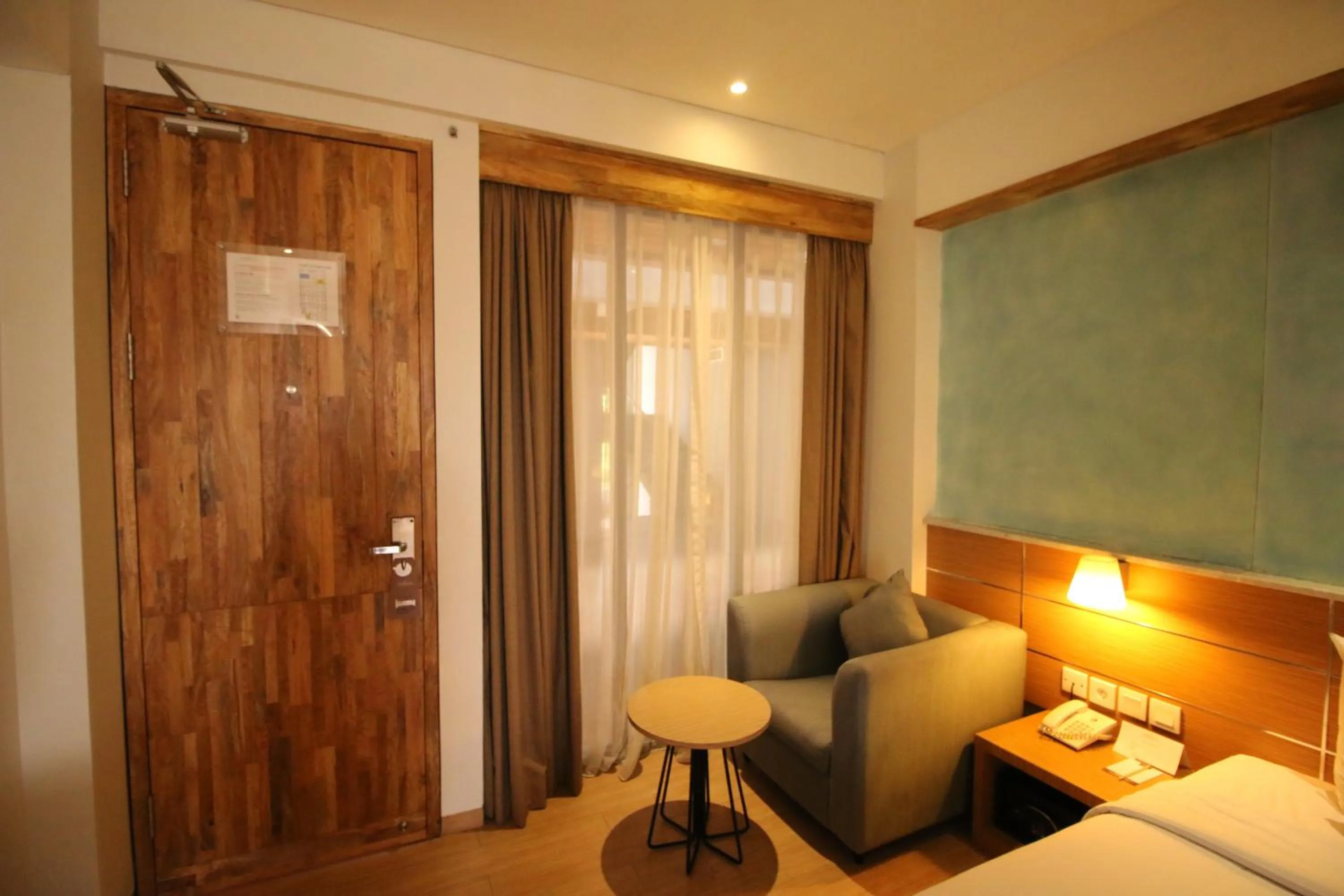 Seating area, Bed in Liberta Hotel Jimbaran