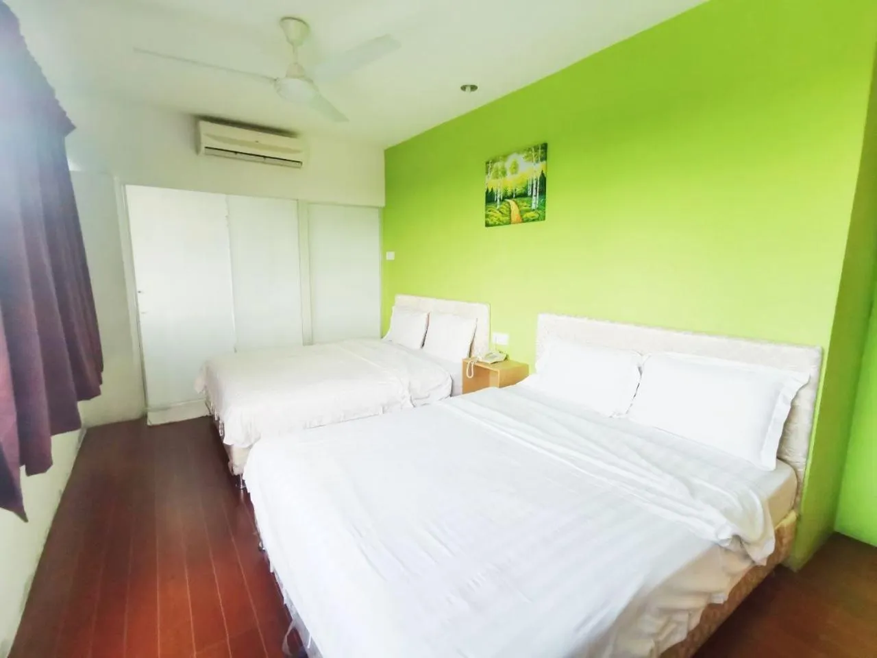 Bed in Homestay Kuching Hotel