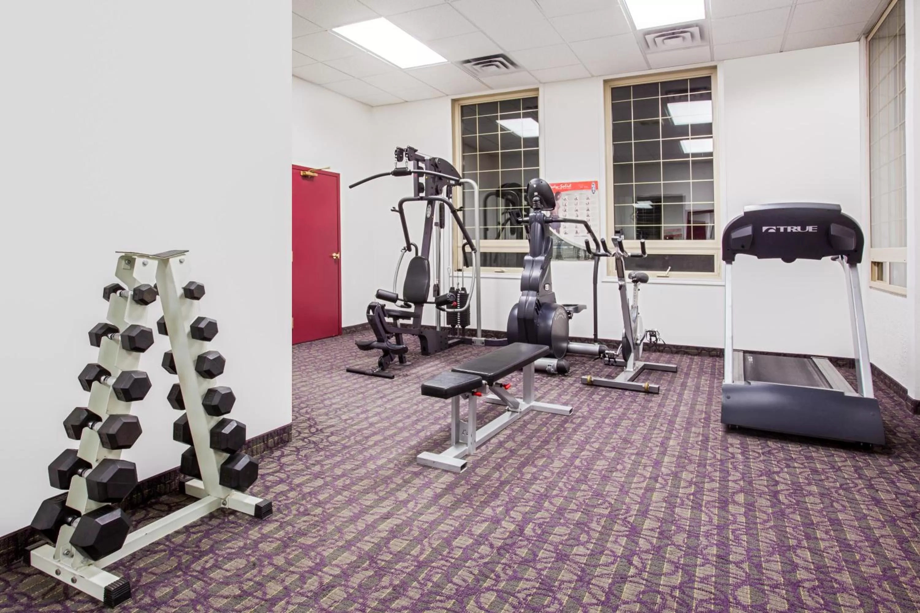 Fitness centre/facilities in Ramada by Wyndham Red Deer Hotel & Suites