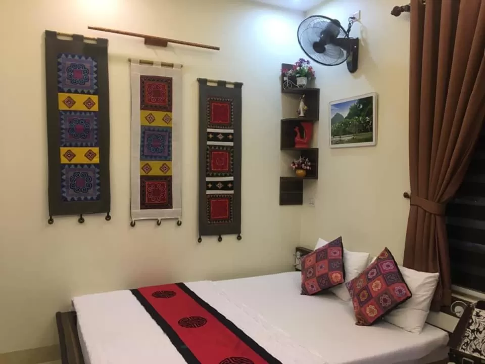 Bed in Friendly Home Hotel