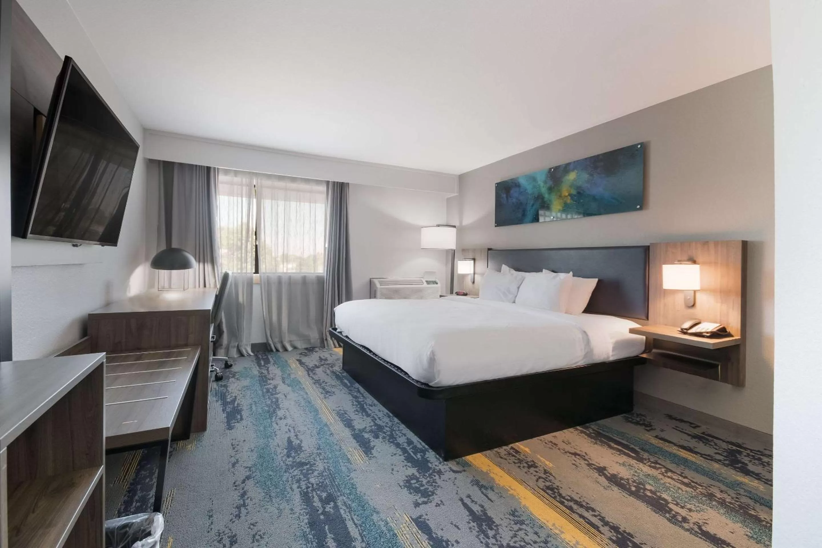 Bedroom in Clarion Pointe OKC Airport