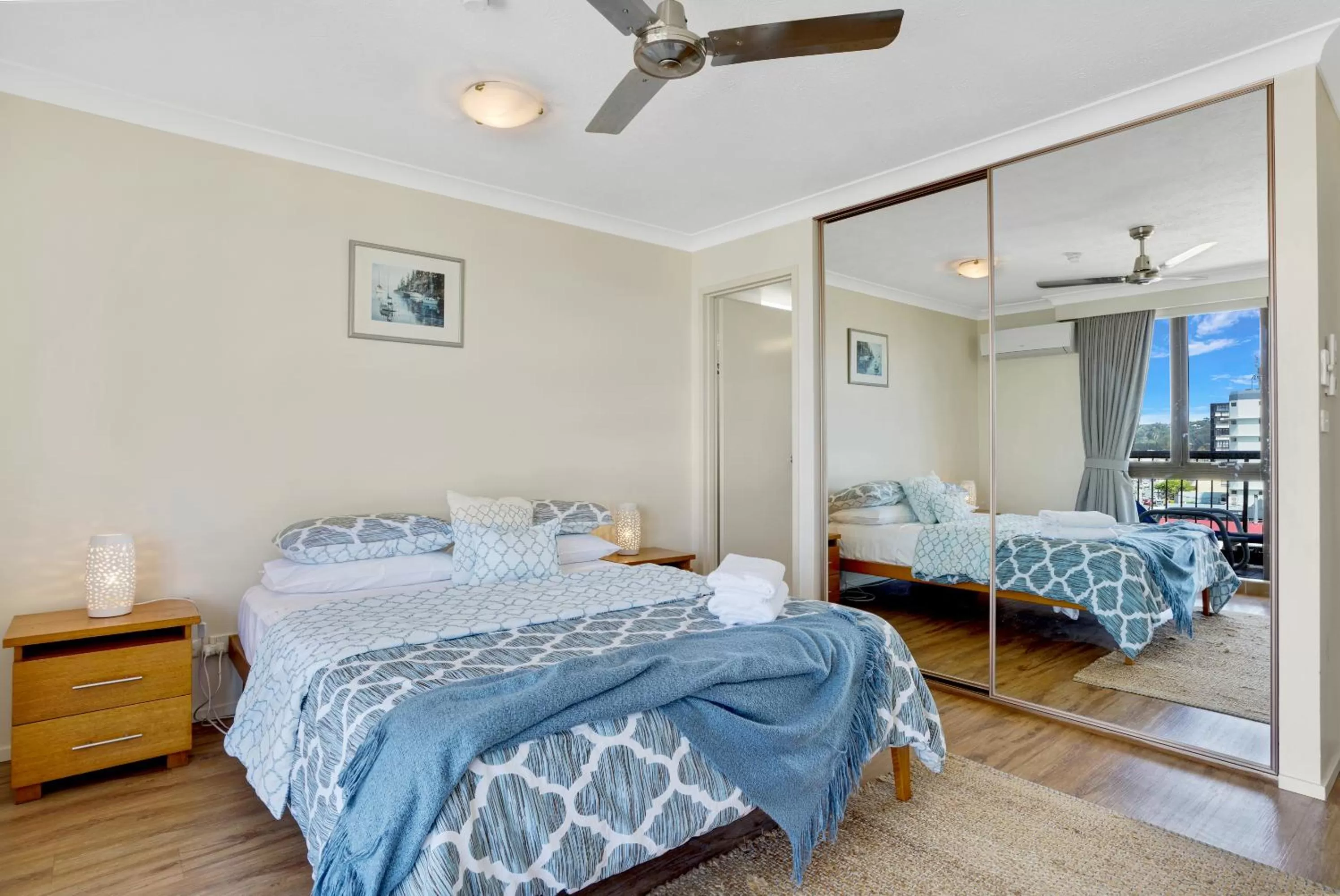 Bed in Beach Palms Holiday Apartments