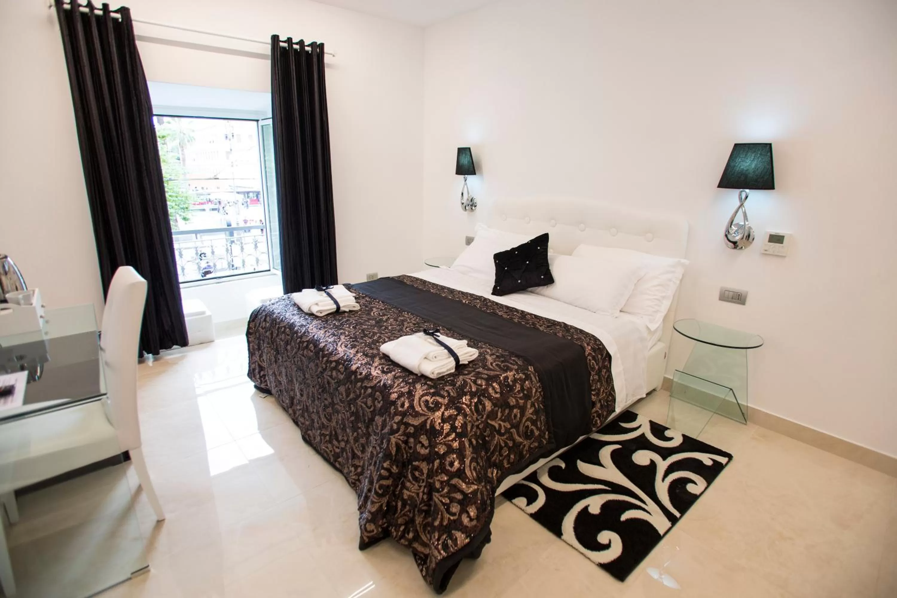 Bed in San Pietro Grand Suite