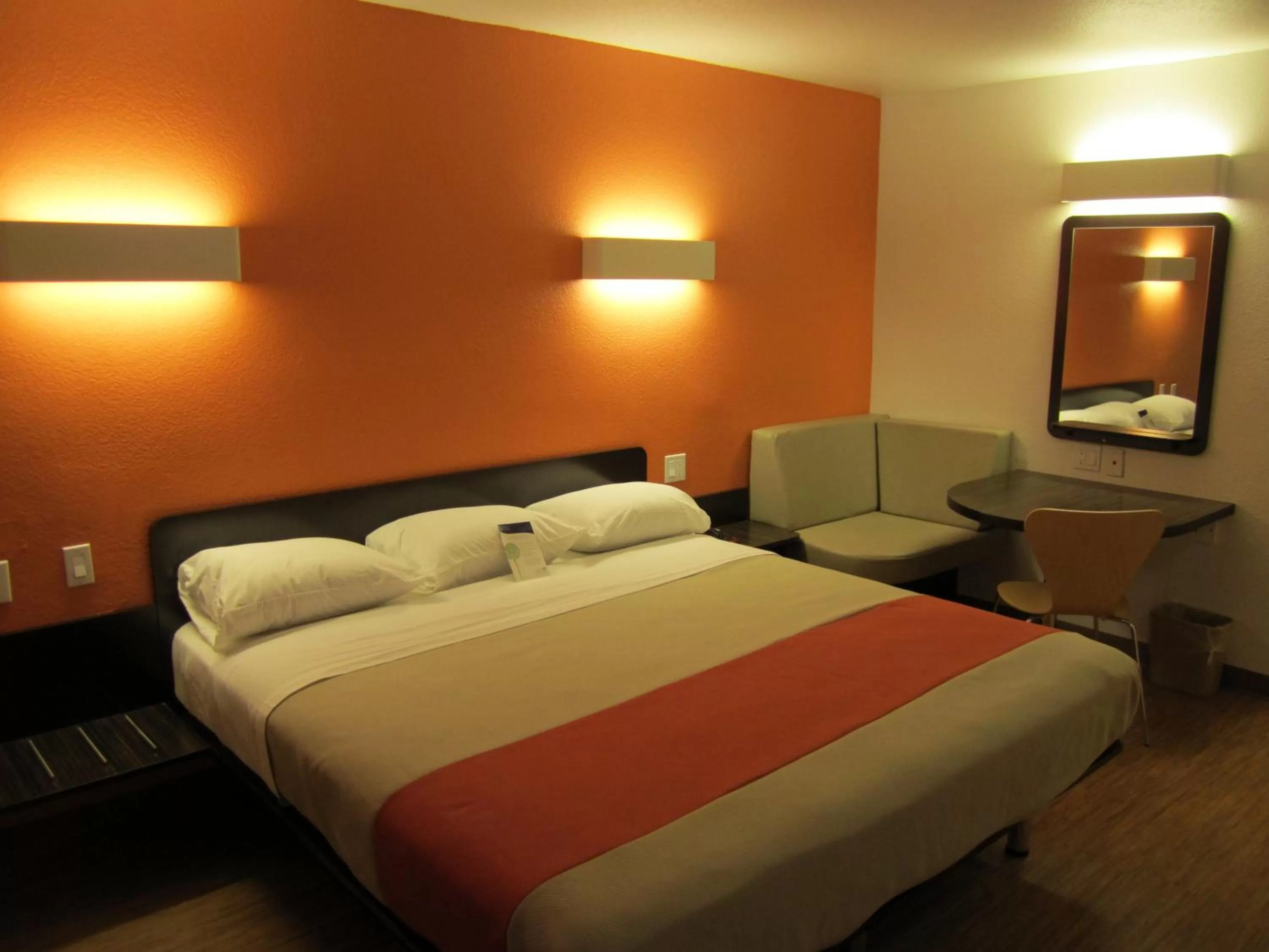 Seating area, Bed in Motel 6-Anaheim, CA