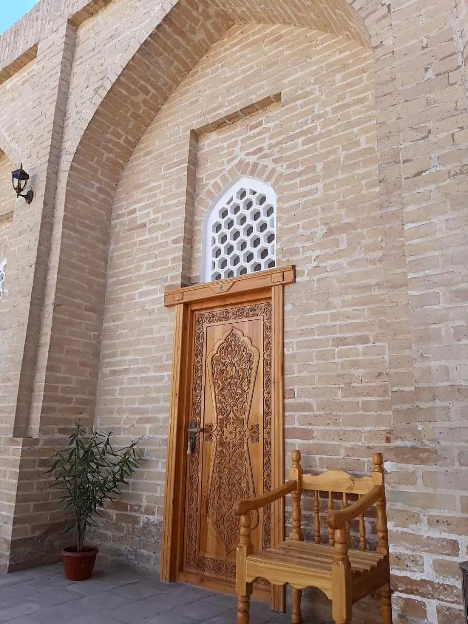 Garden in madrasah Polvon-Qori boutique hotel XIX century