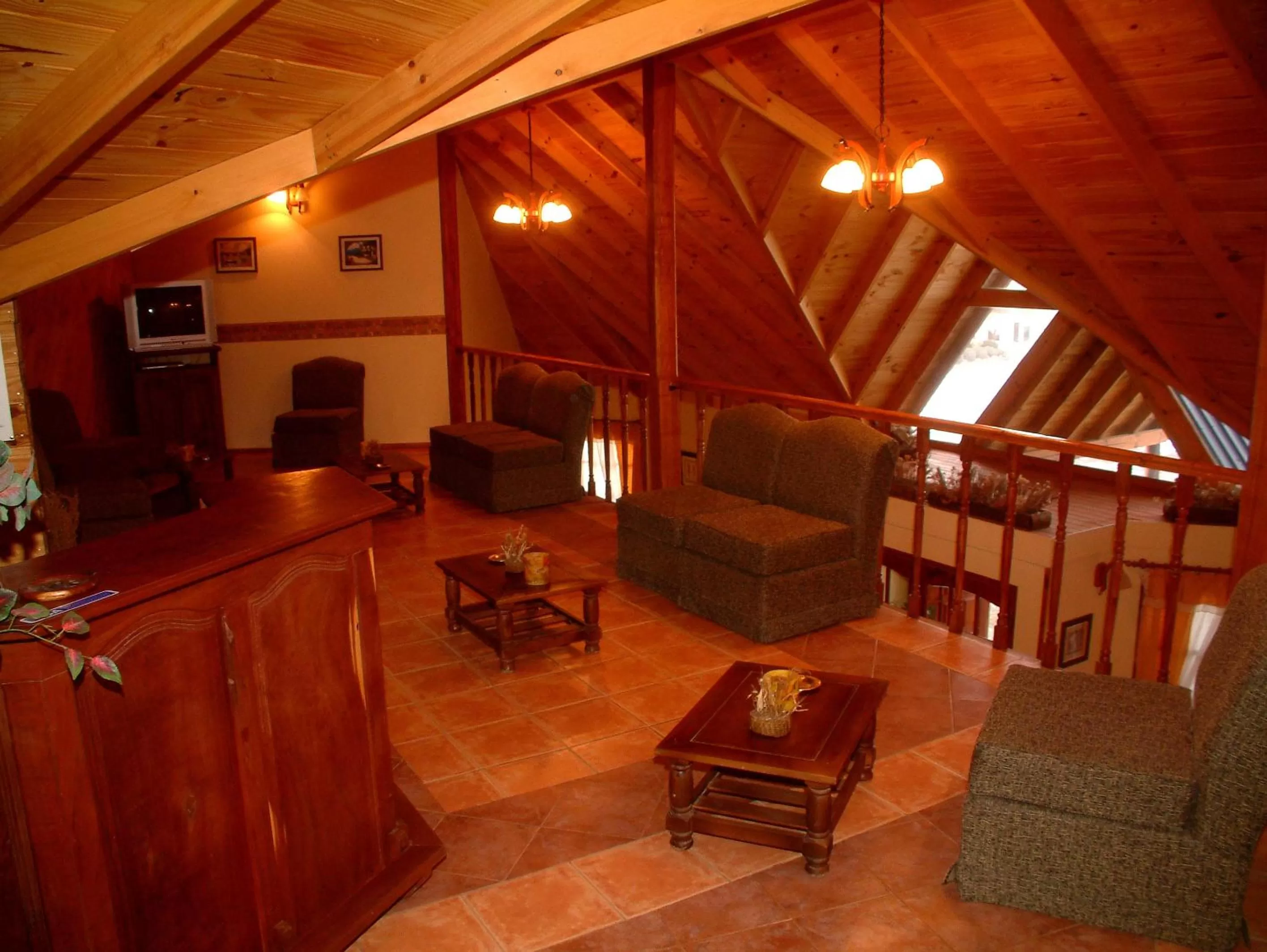 Communal lounge/ TV room in Hosteria Vientos Del Sur