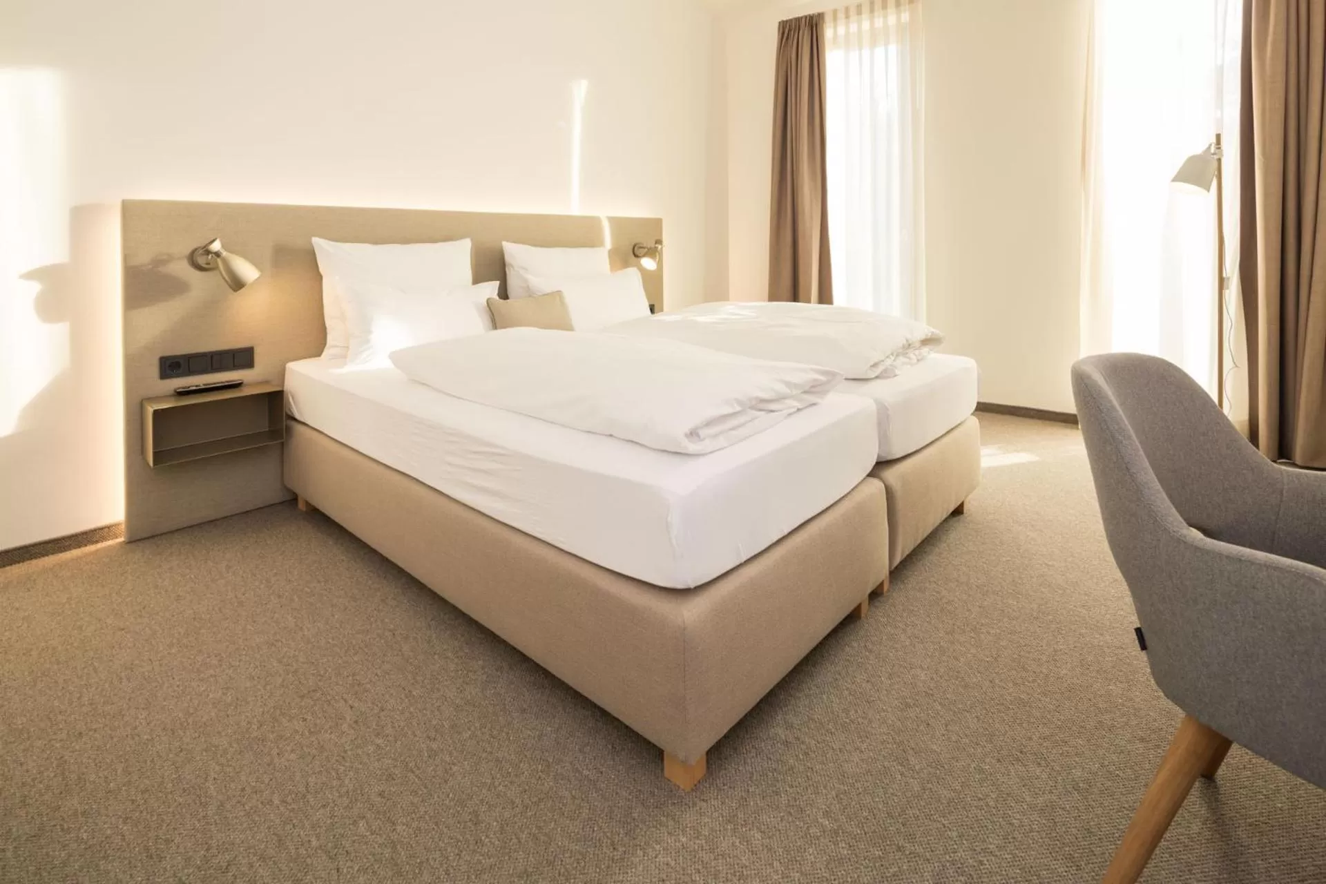 Bed in Das ACKER Hotel