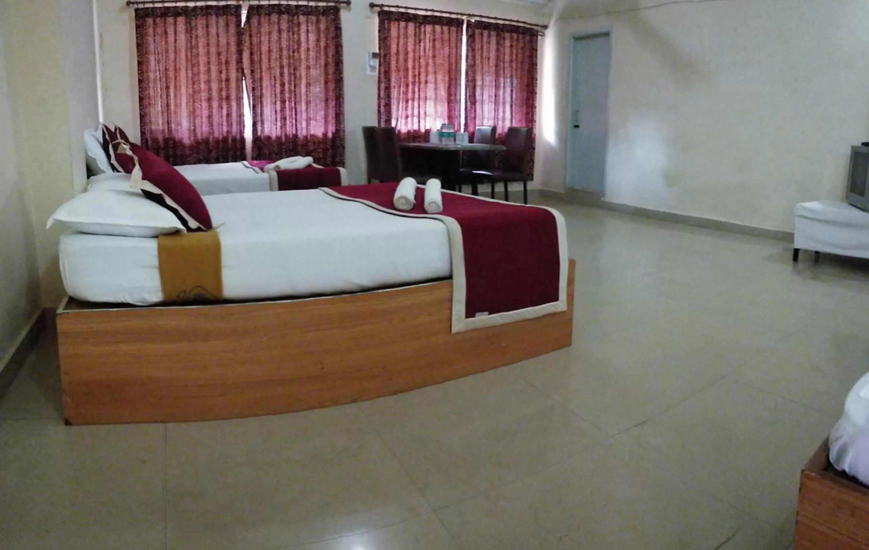 Bed in KSTDC Hotel Mayura TalaKaveri, Bhagamandala