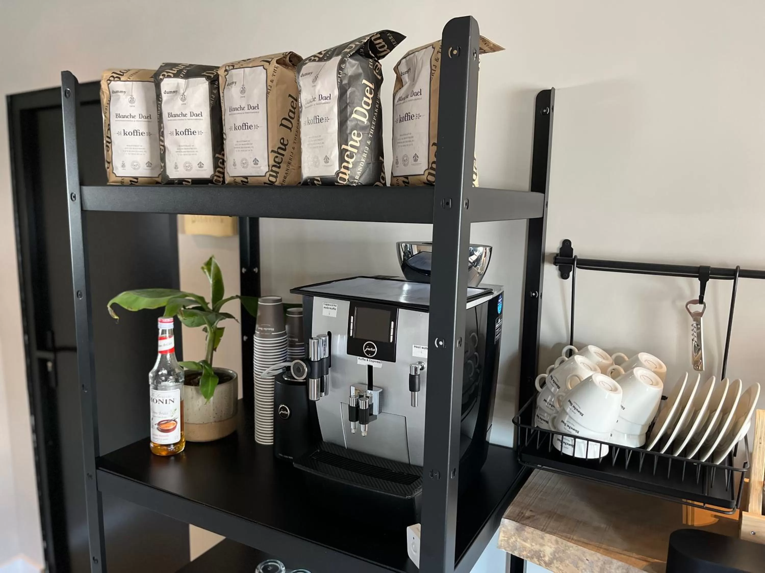 Communal lounge/ TV room in Boutique Hotel Le Faucon