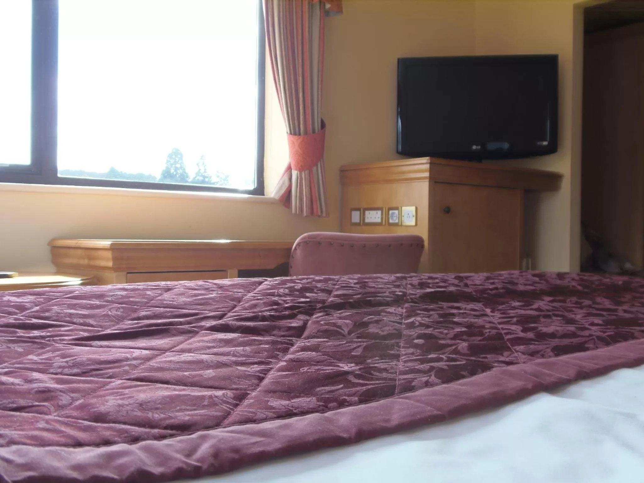 Photo of the whole room, Bed in Lakeside International Hotel