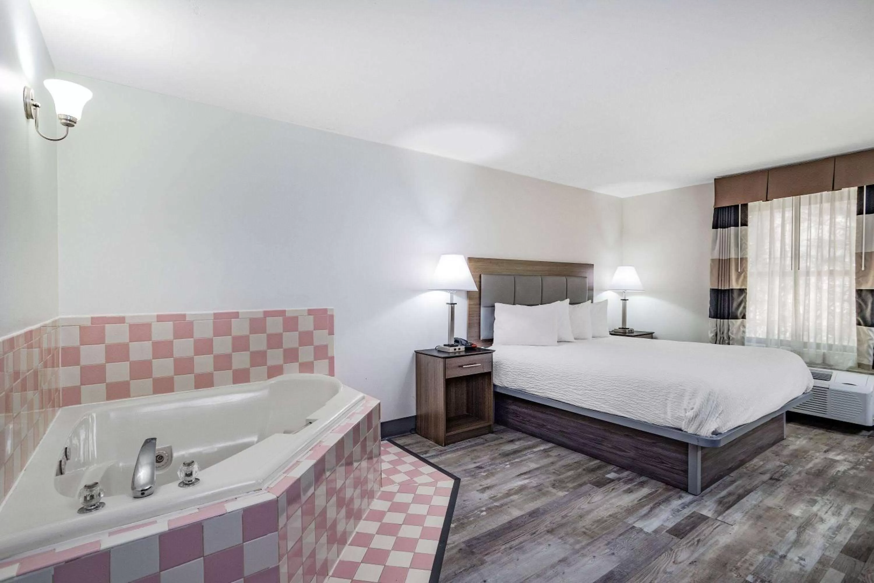 Bed in Ramada by Wyndham Hendersonville