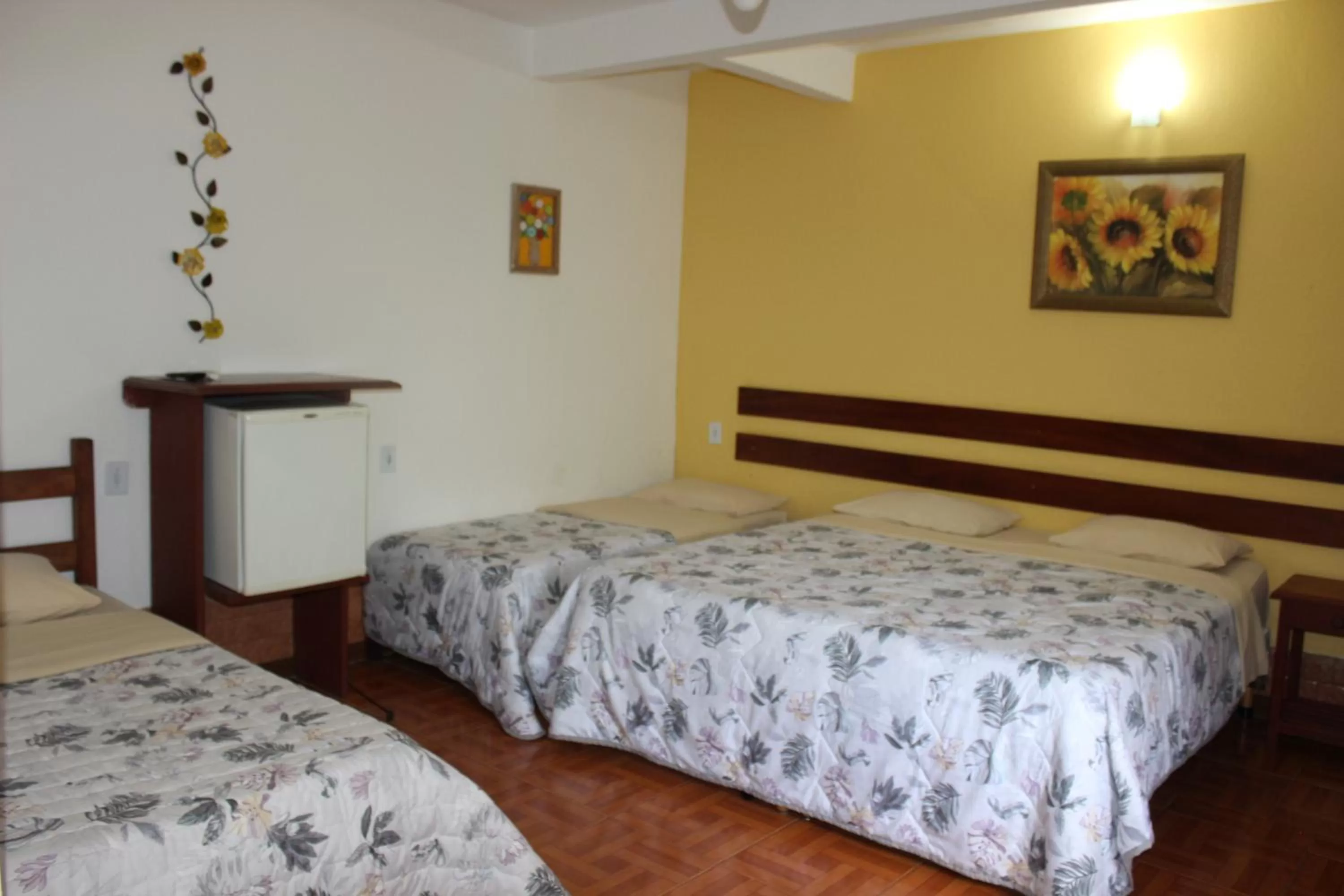 Bed in Pousada Flor de Paraty