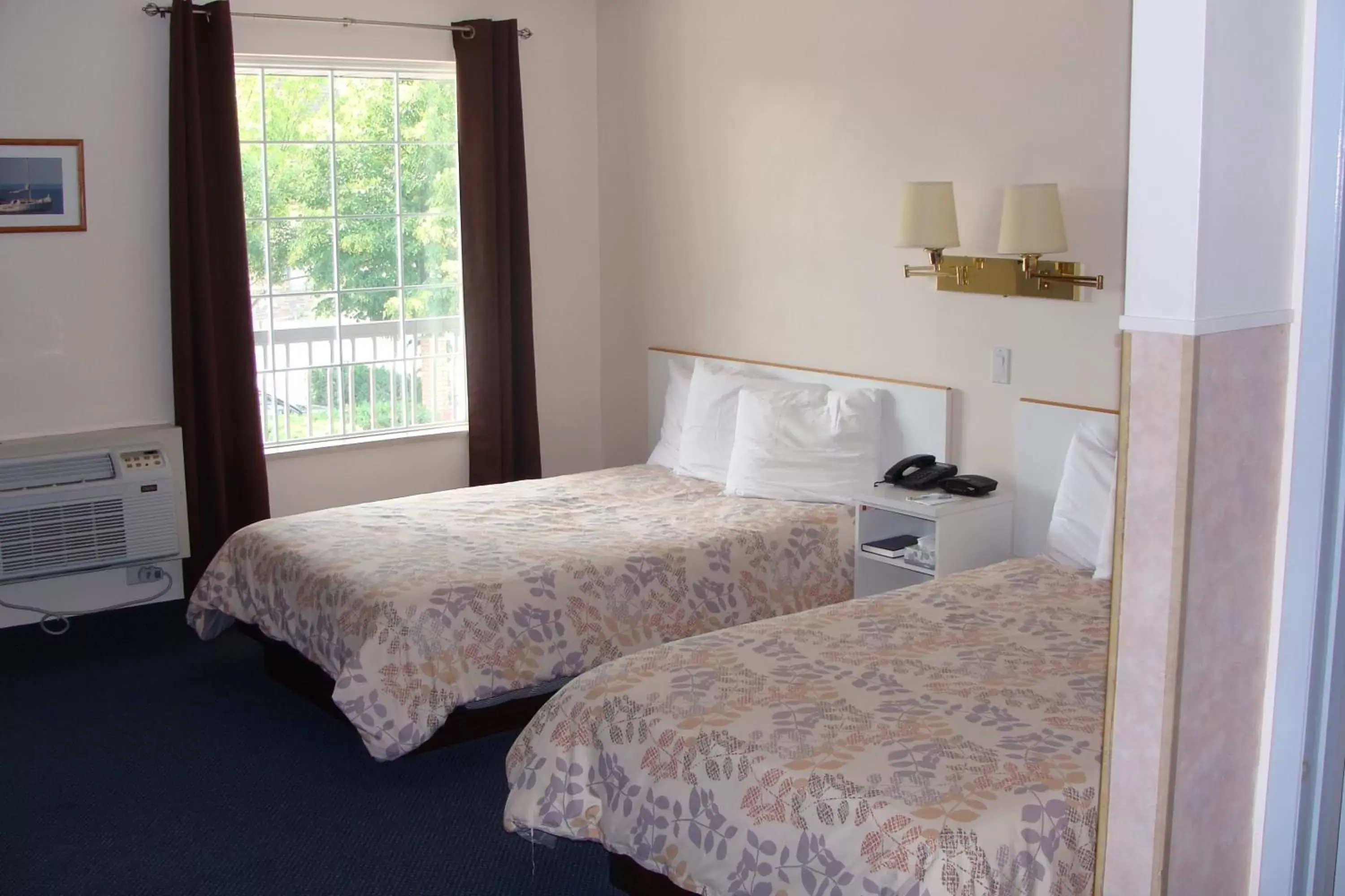 Double Room with Two Double Beds in Leisure Inn Double Room with Two Double Beds in Leisure Inn