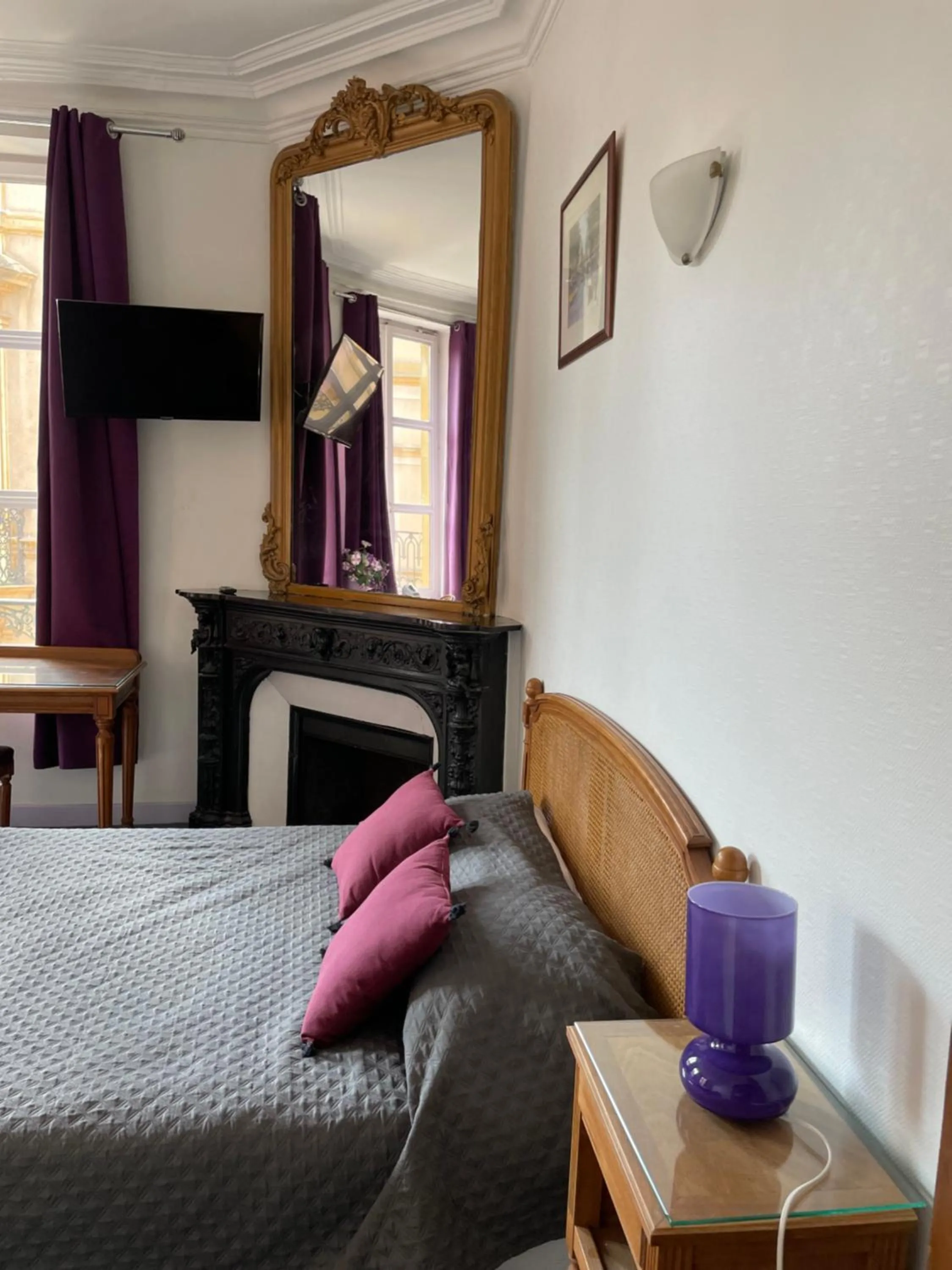 Bedroom in Hôtel du Centre