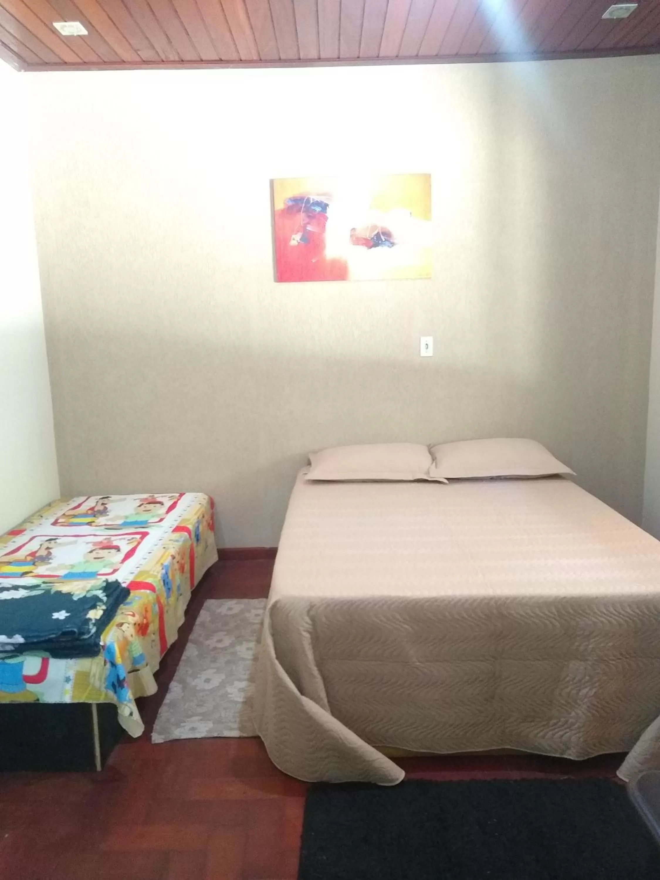 Bed in Pousada do Ribeirão