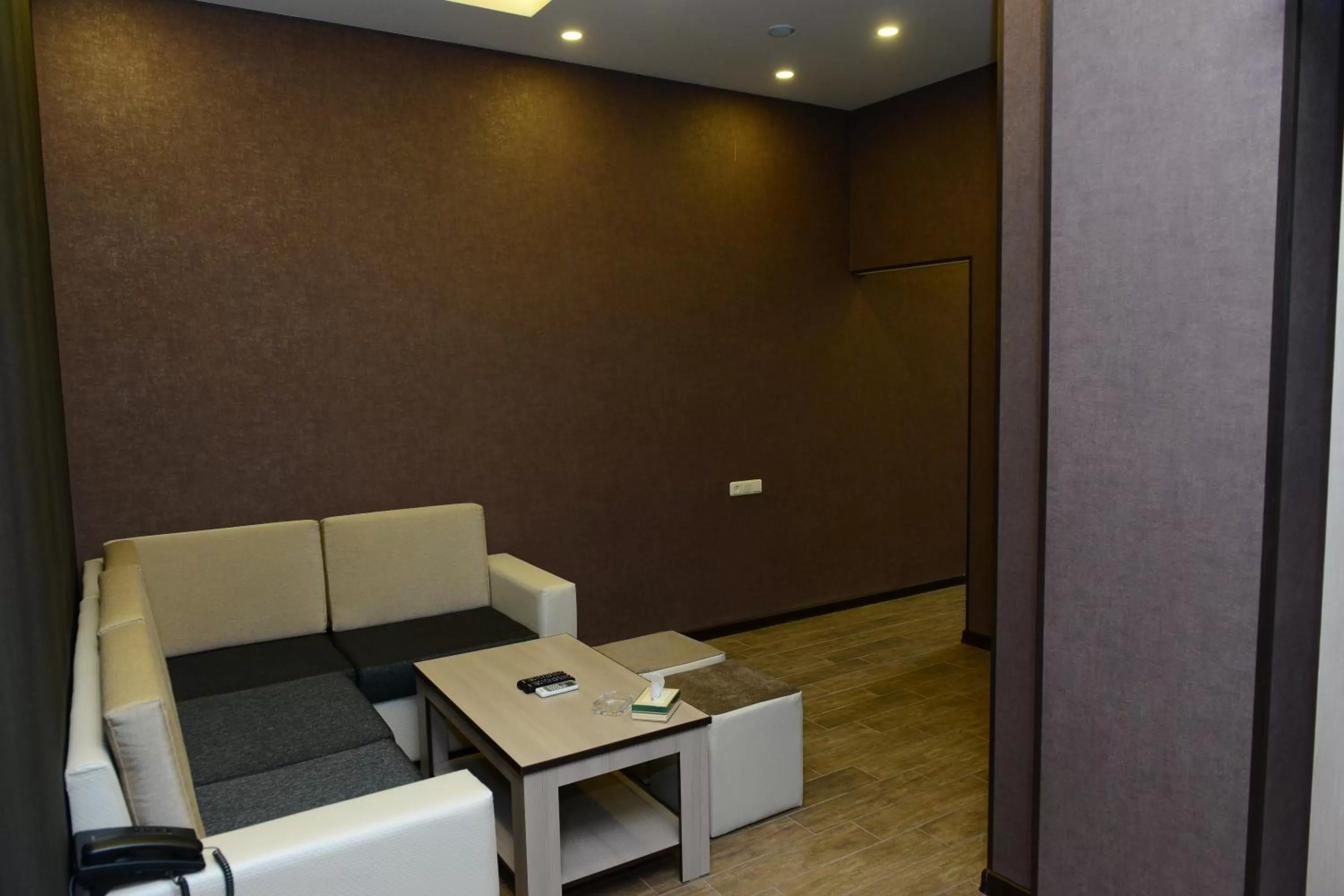 Communal lounge/ TV room, Seating Area in Eridana Hotel