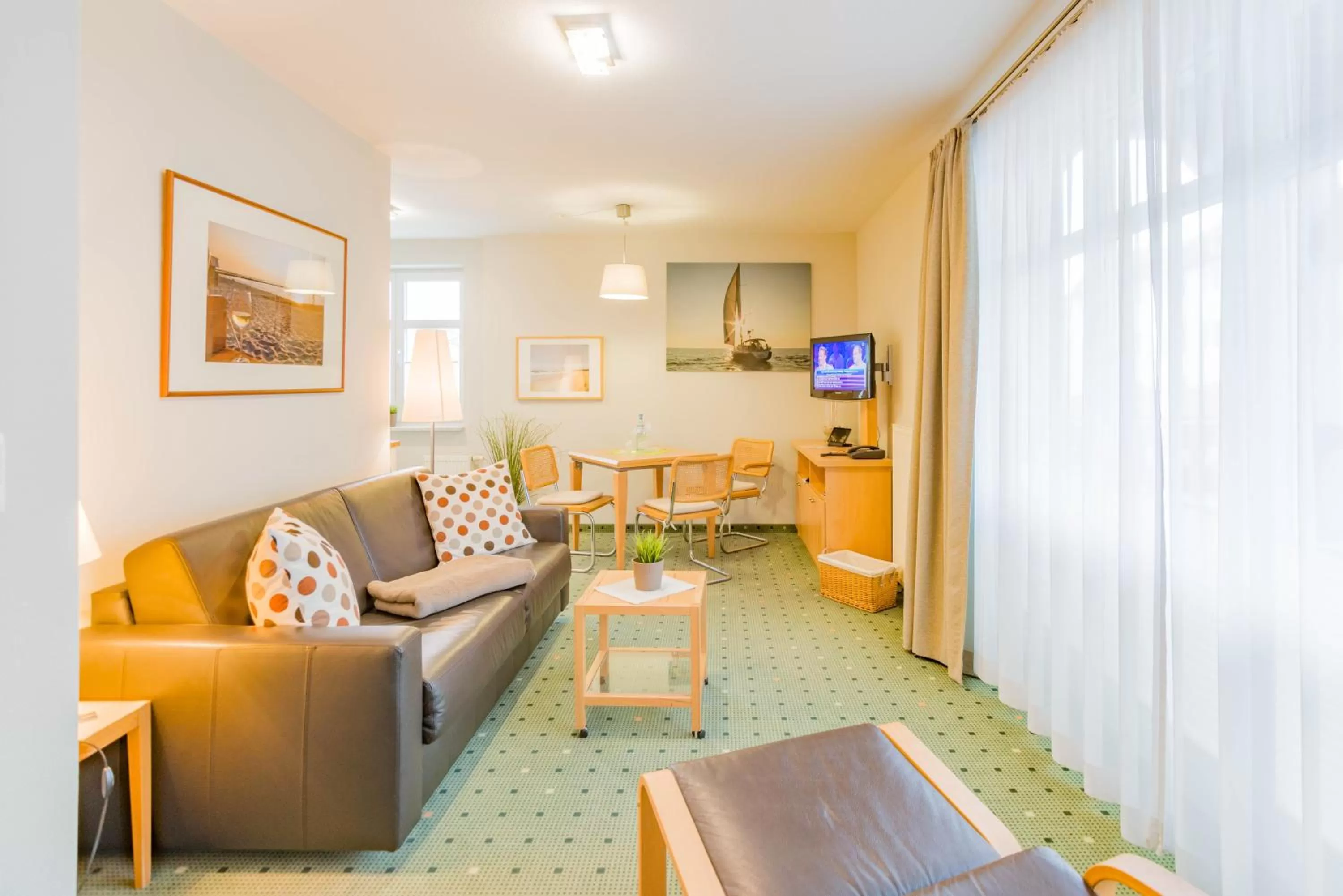 Photo of the whole room, Seating Area in Am Weststrand Apartmenthaus Waldeck