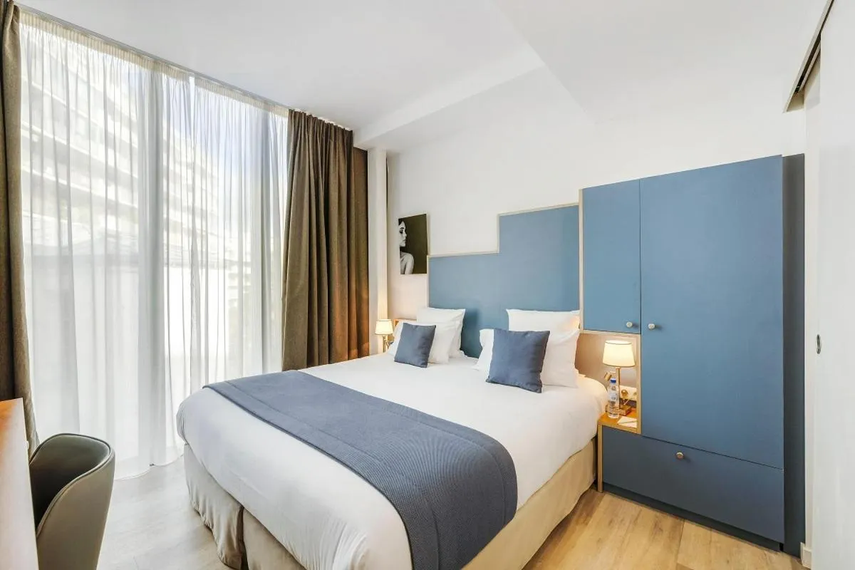 Bed in Hôtel Villa Eiffel Mademoiselle