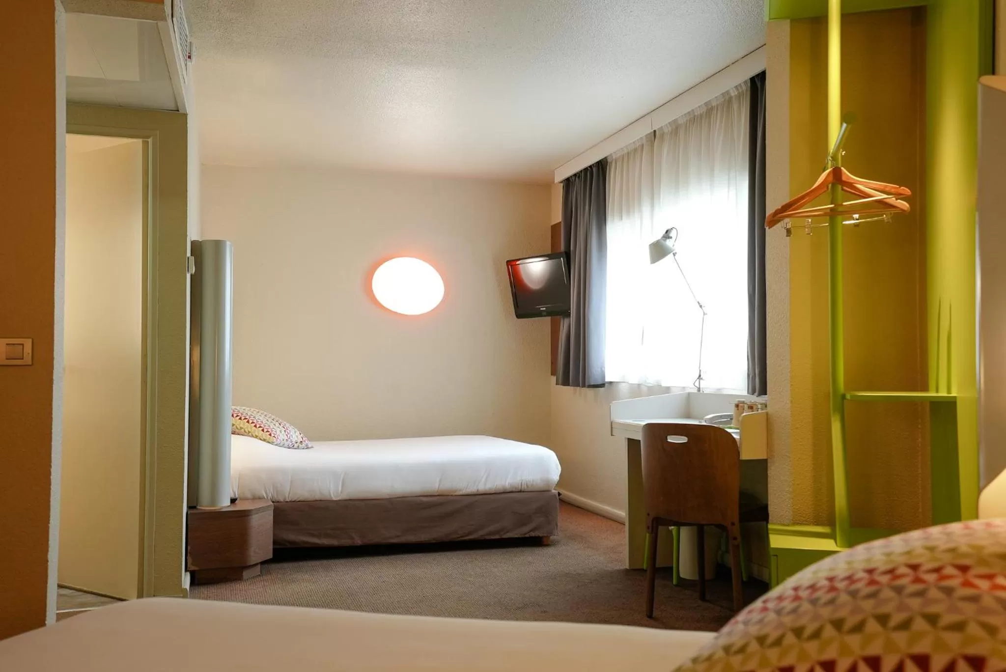 Photo of the whole room, Bed in Campanile Paris CDG Airport Villepinte