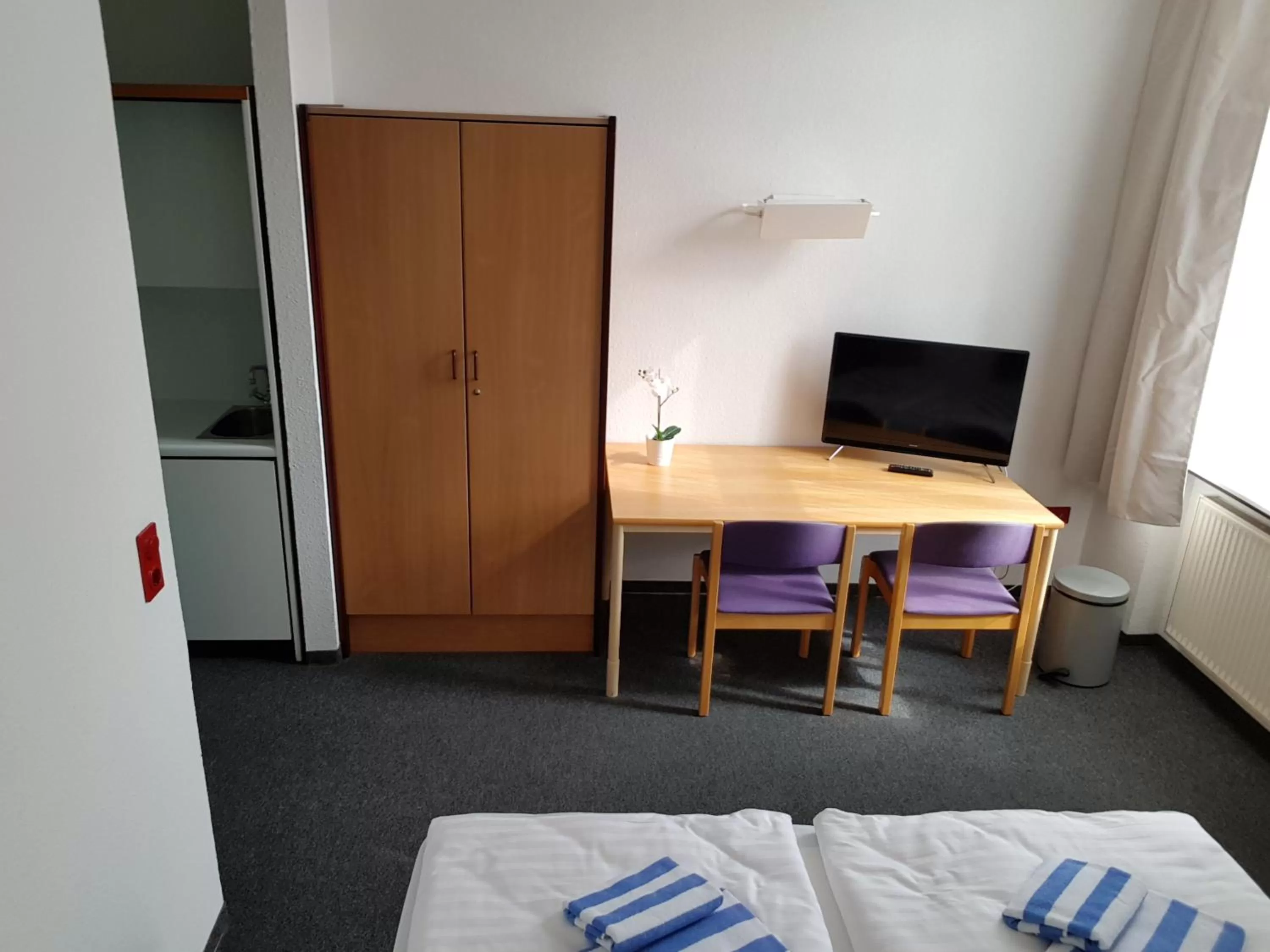 Bed in Appartement-Hotel Rostock