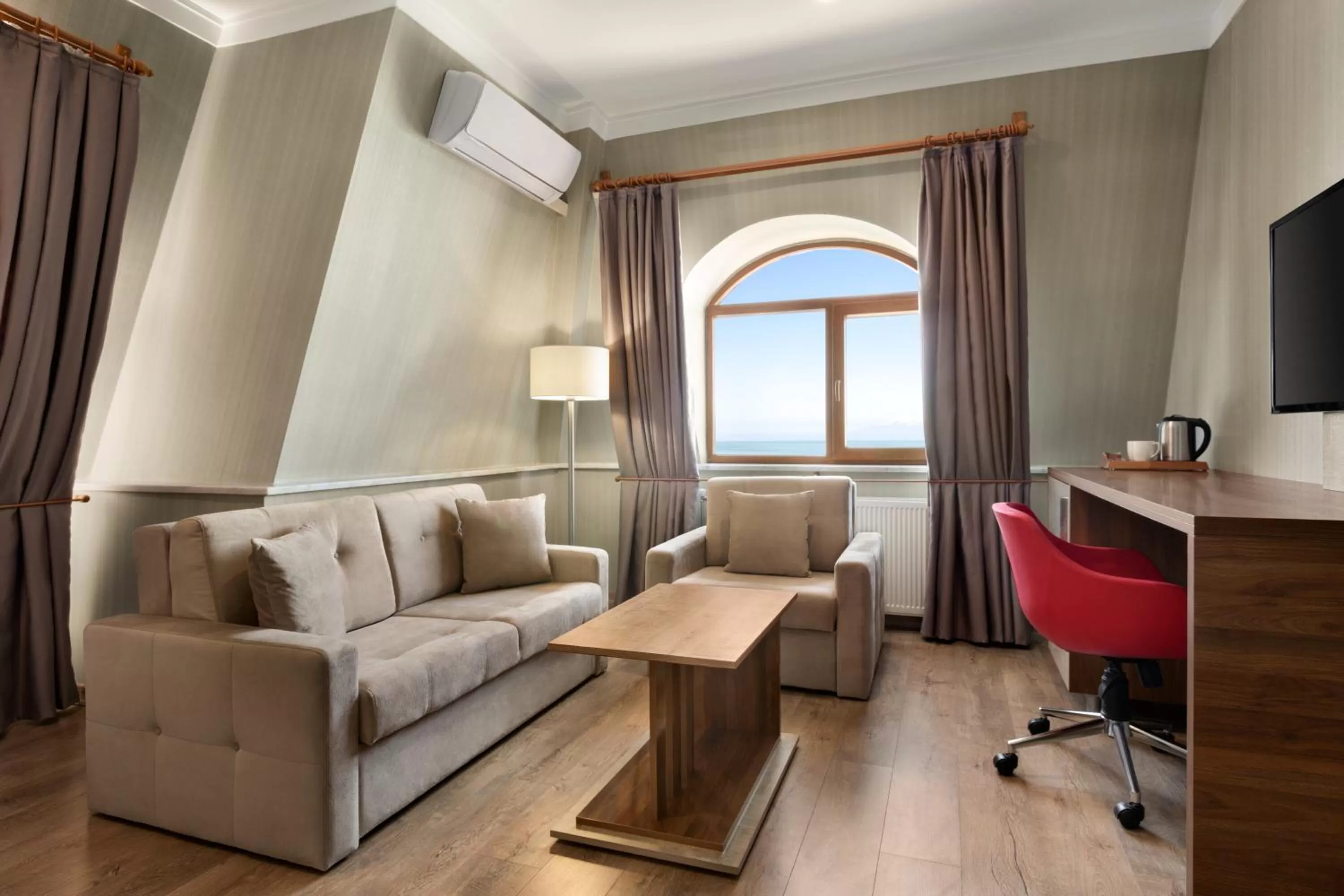 Living room in Ramada by Wyndham Van