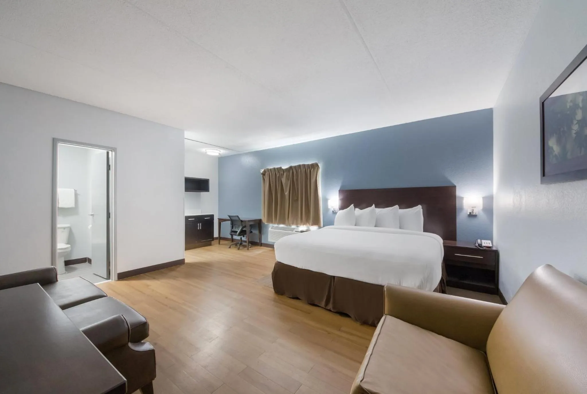 Bedroom, Bed in HomeTowne Studios by Red Roof San Antonio - SeaWorld Northwest