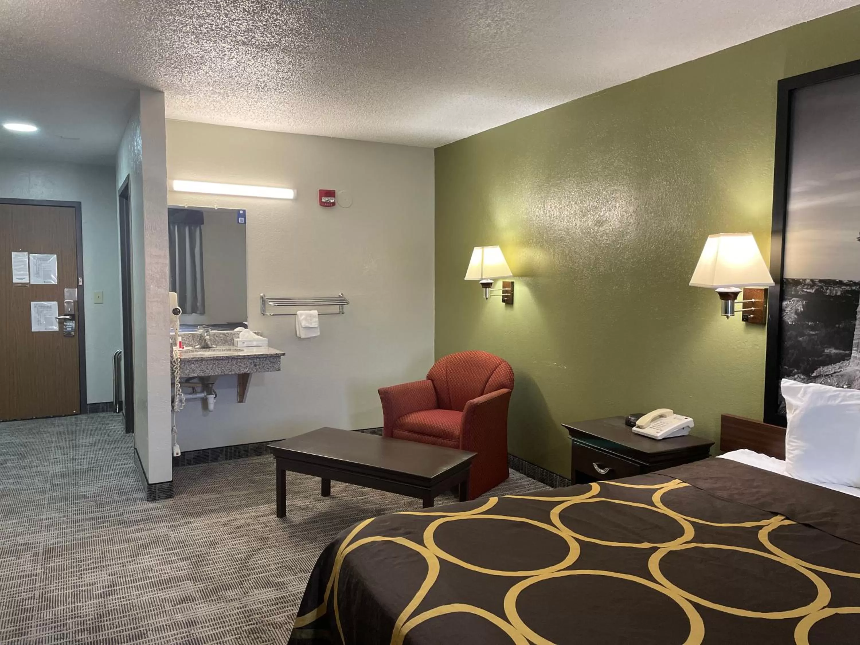 Living room, Bed in Super 8 by Wyndham Amarillo Central TX