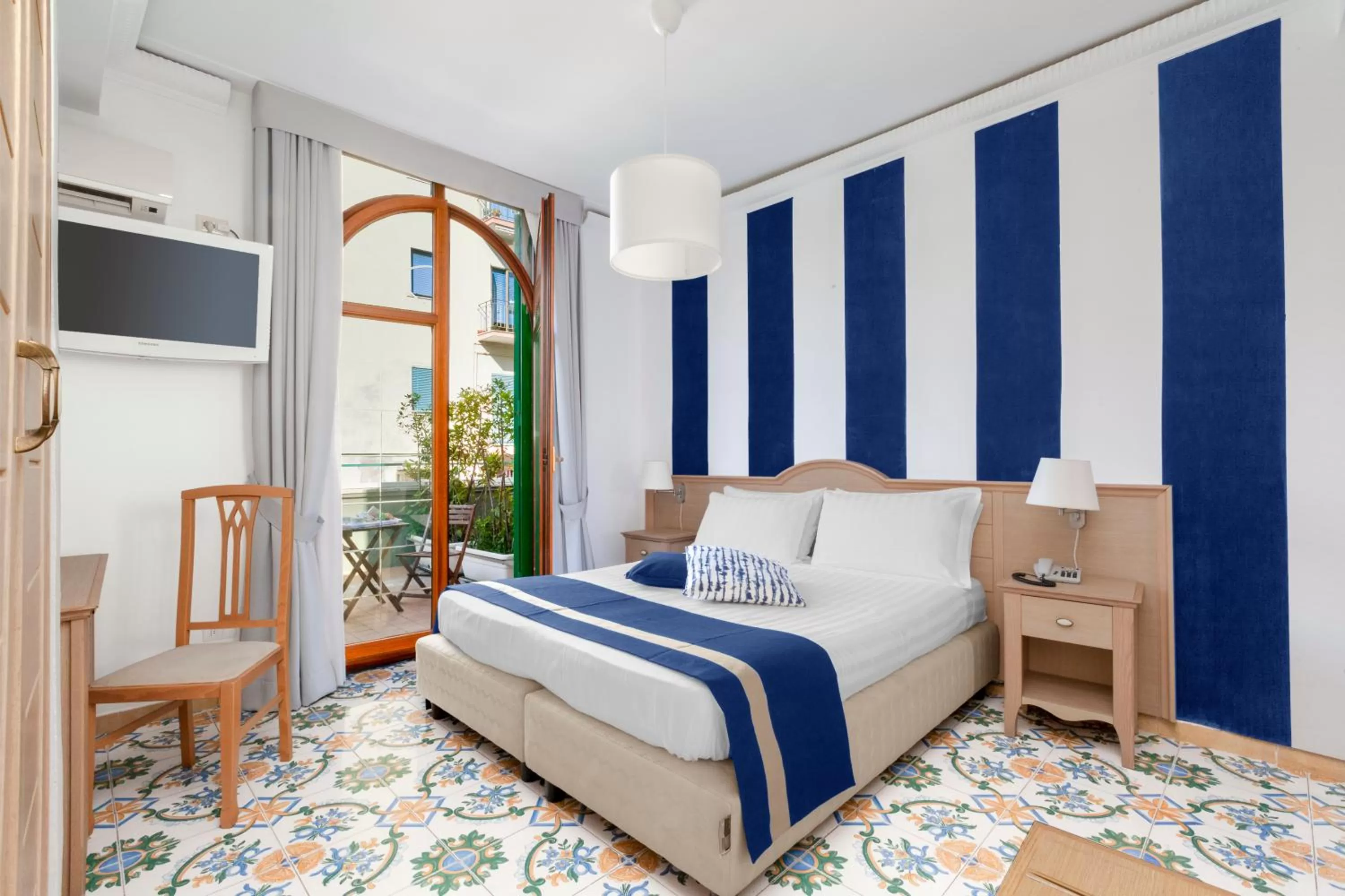 Bed in Hotel Herculaneum