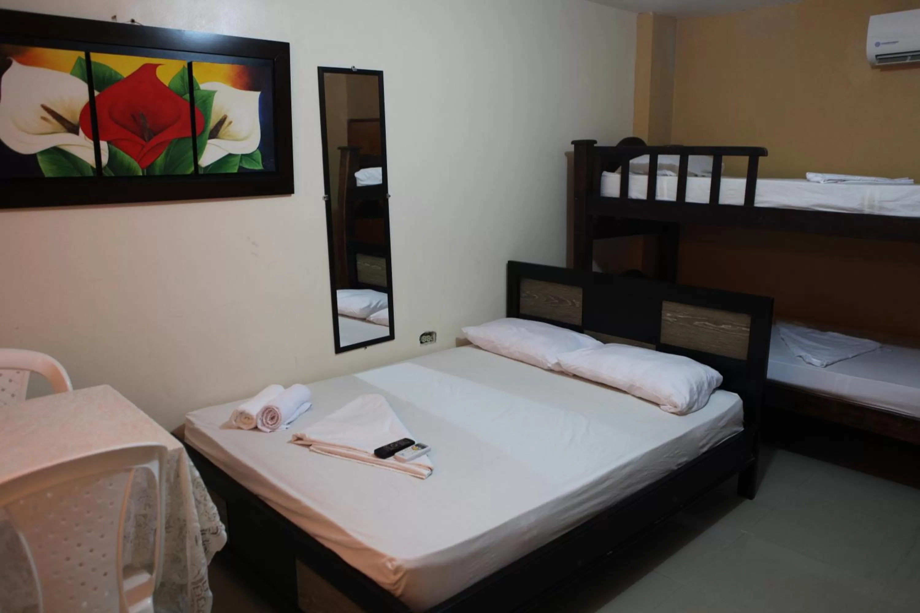Photo of the whole room, Bed in Hotel Boquilla Suites By GEH Suites