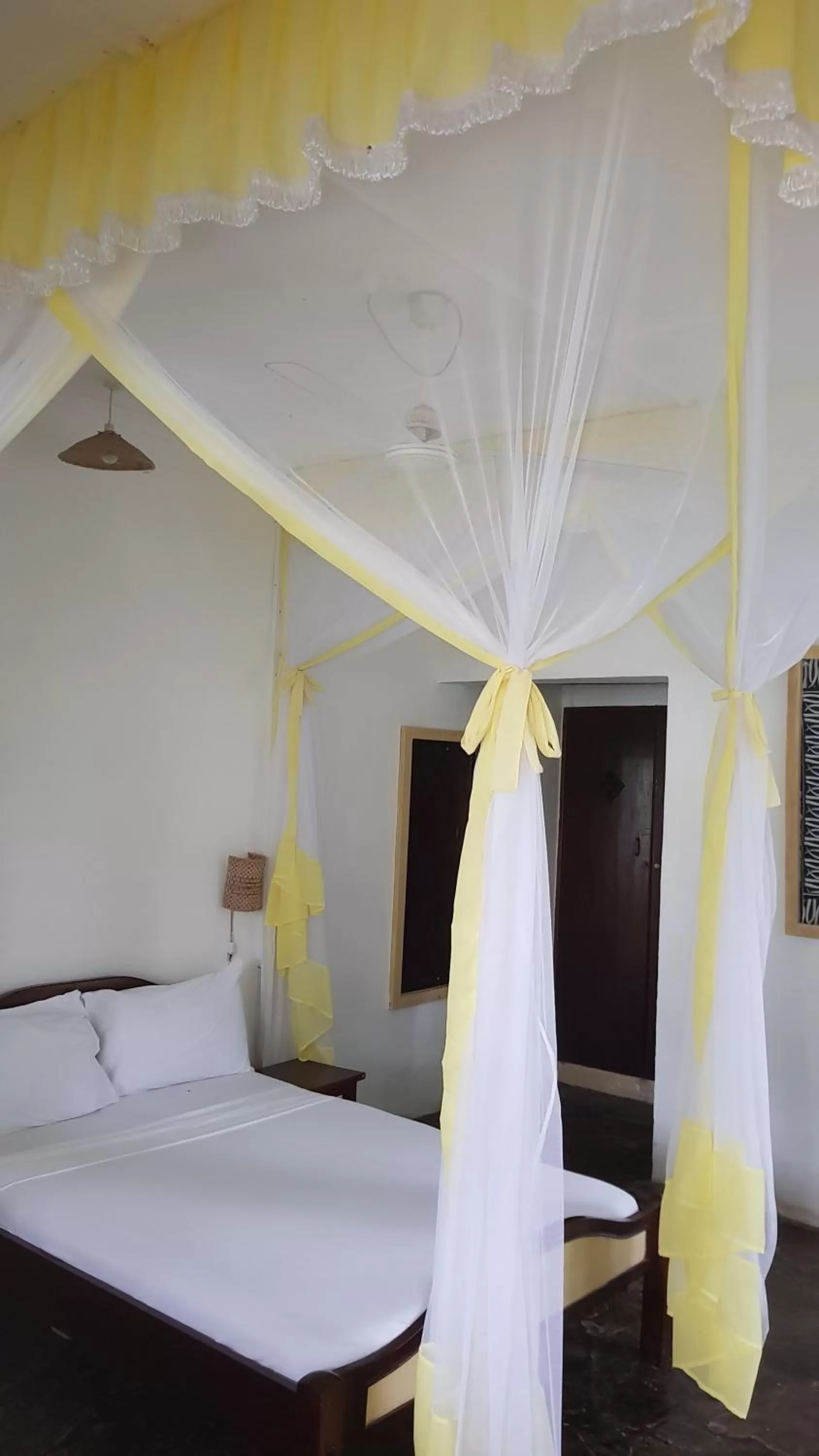 Bed in Makuti Villas Resort