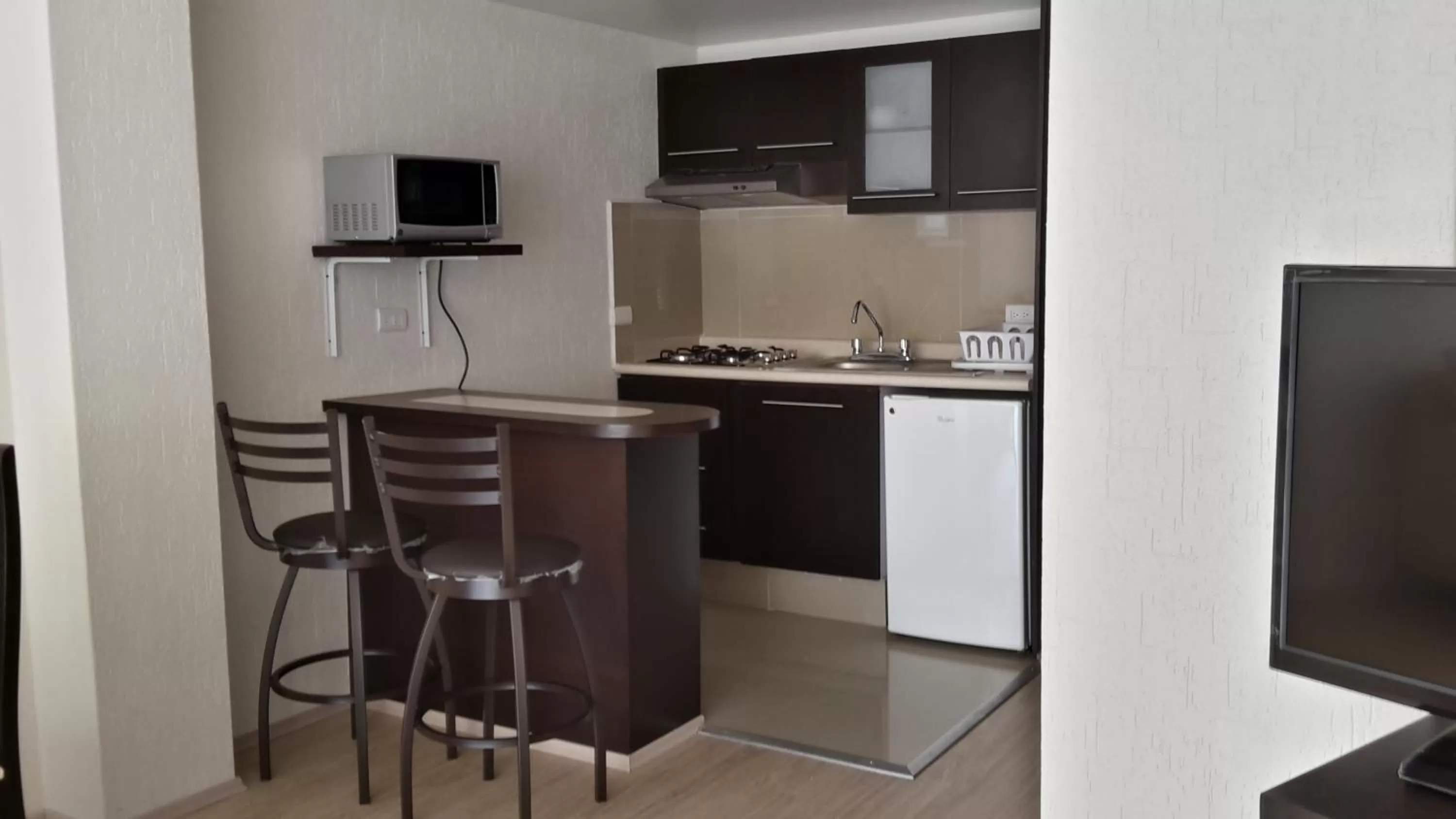 Kitchen or kitchenette in Grupo Kings Suites -Monte Chimborazo 537