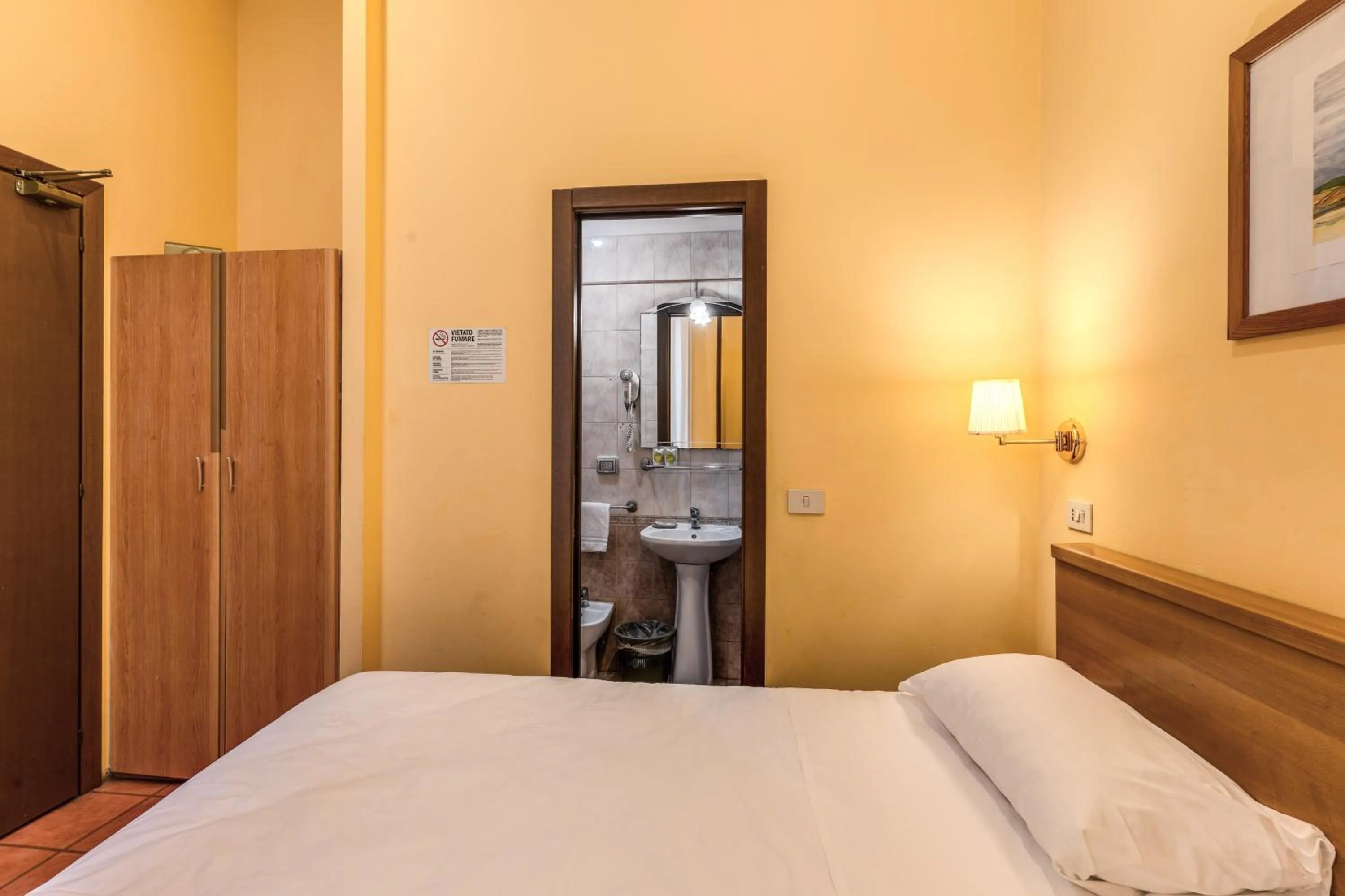 Bed in Hotel Pomezia