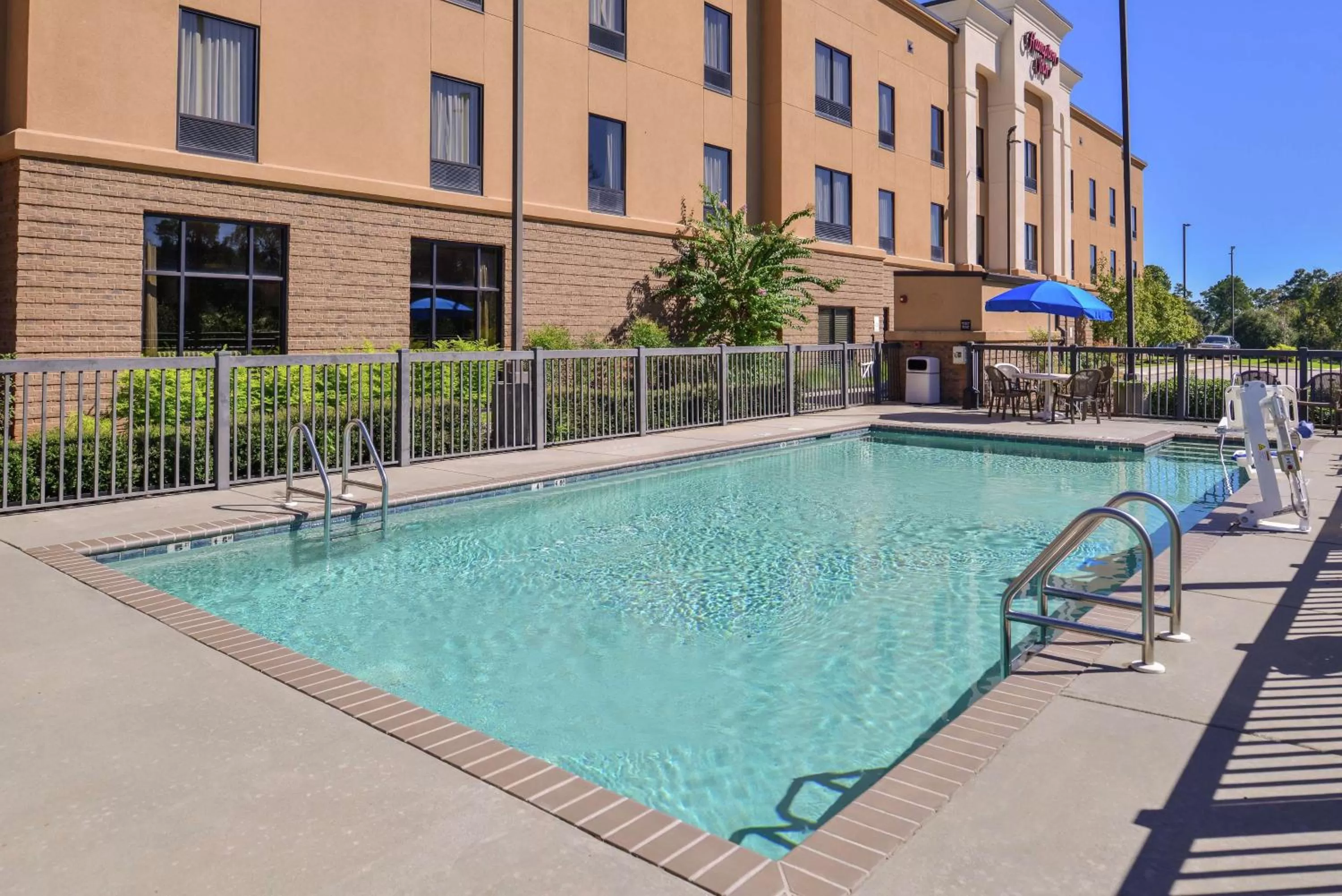 Pool view in Hampton Inn Jackson-College Avenue