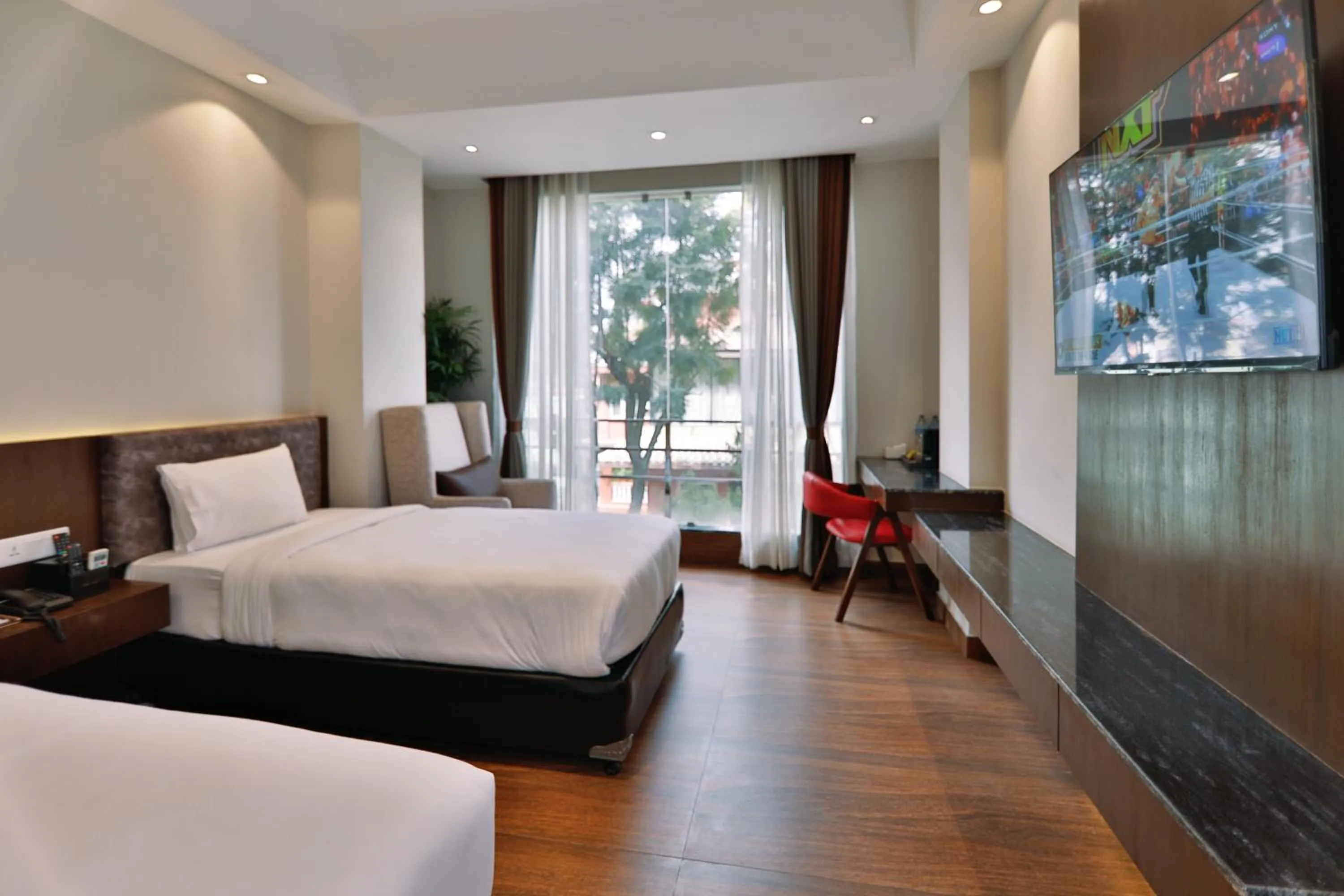 Garden view, Bed in Lakhey Hotel