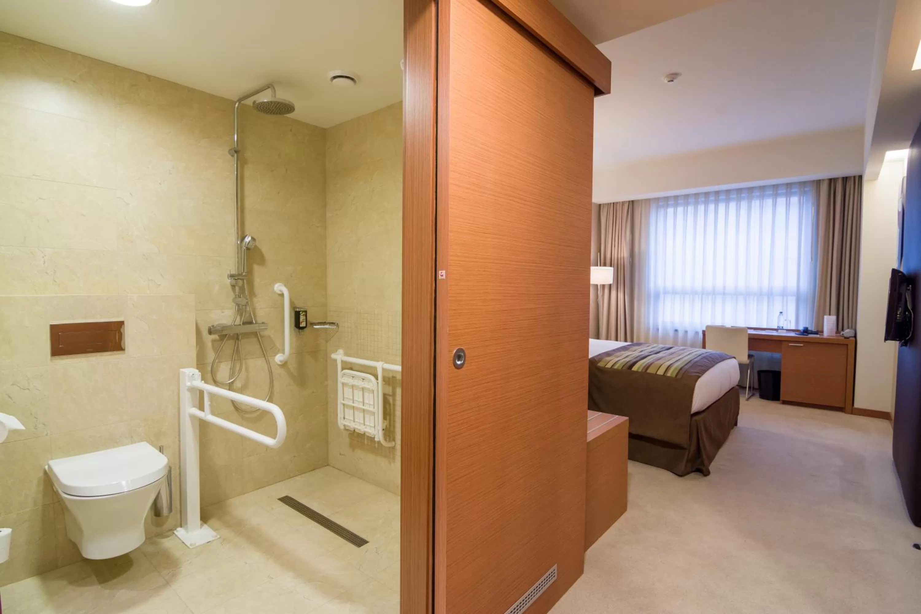 Shower, Bed in Ramada by Wyndham Oradea